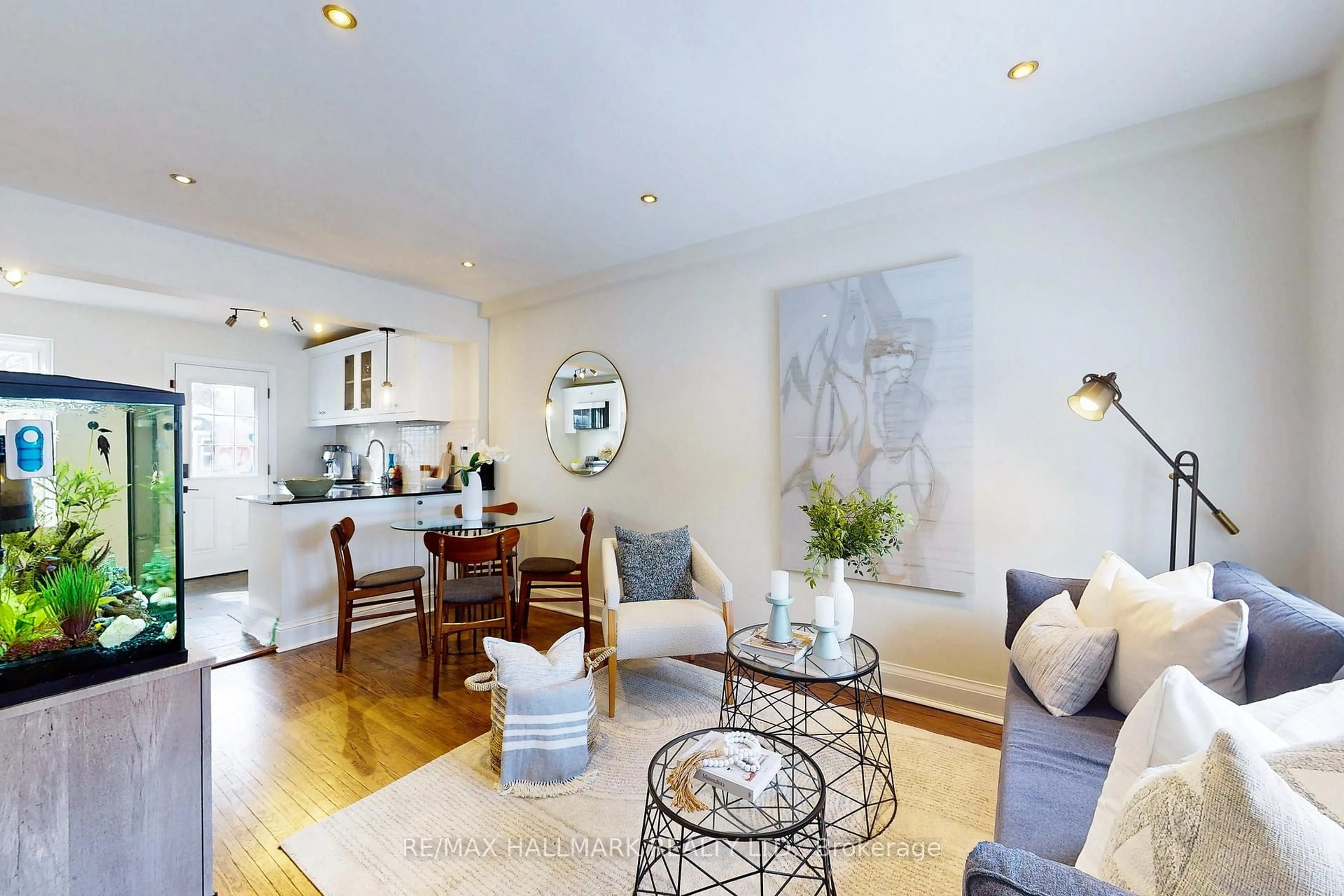 Living room with furniture, wood/laminate floor for 3320 Bathurst St, Toronto Ontario M6A 2B6