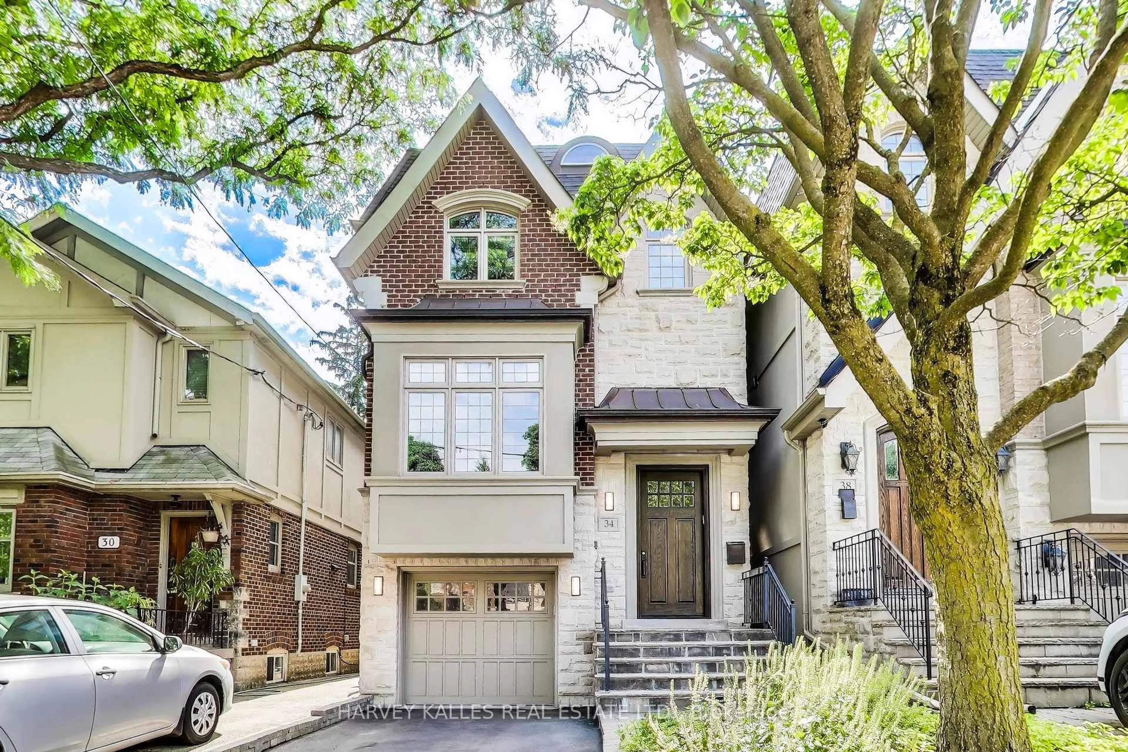 Home with brick exterior material, street for 34 Latimer Ave, Toronto Ontario M5N 2L8