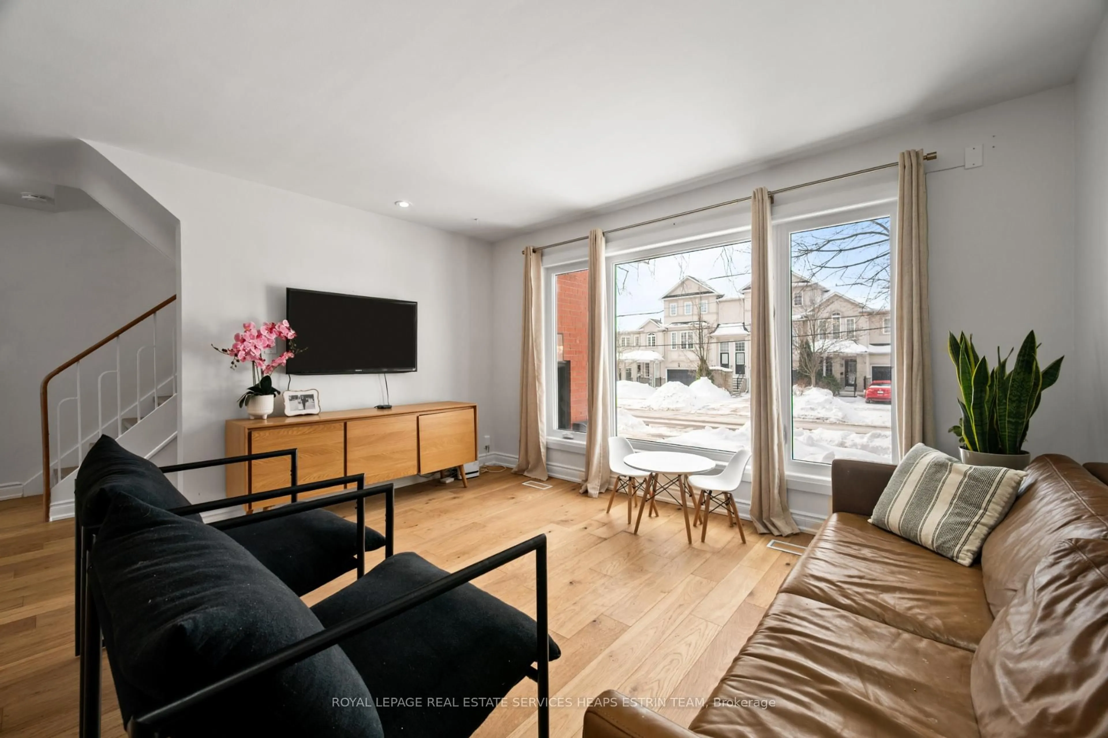 Living room with furniture, unknown for 130 Barber Greene Rd, Toronto Ontario M3C 2A5