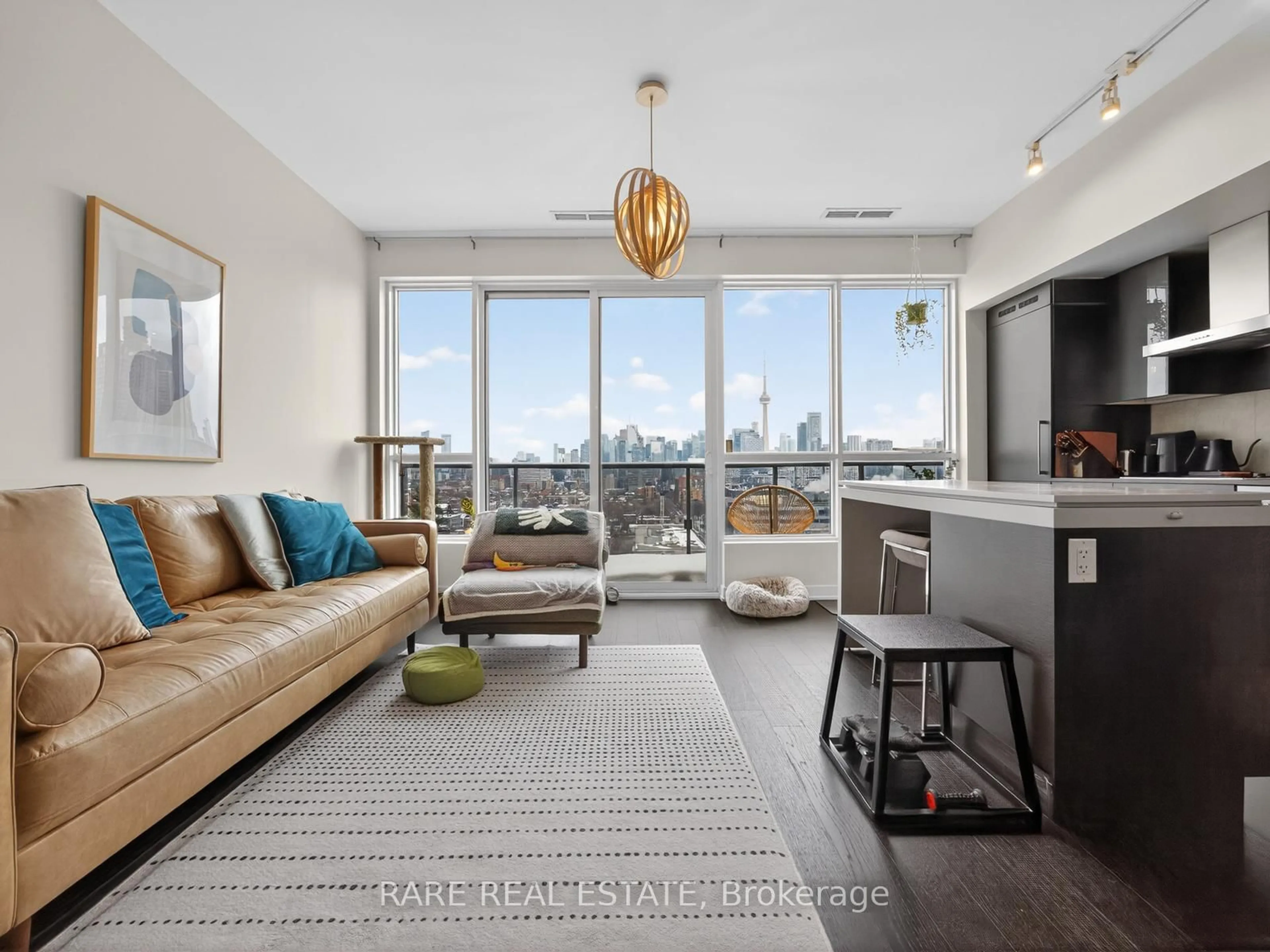 Living room with furniture, wood/laminate floor for 1030 King St #PH09, Toronto Ontario M6K 0B4