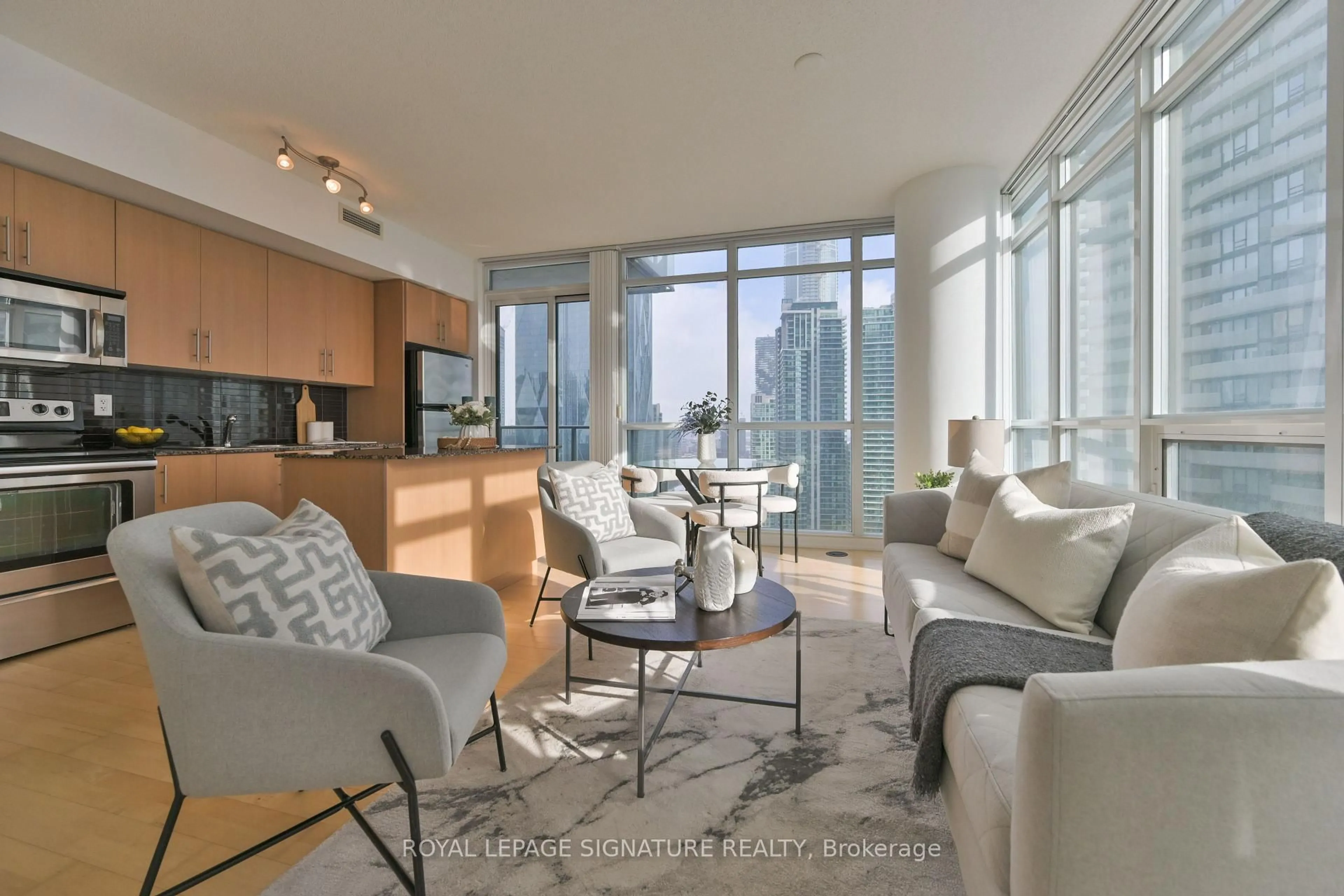 Living room with furniture, unknown for 55 Bremner Blvd #3007, Toronto Ontario M5V 3V8