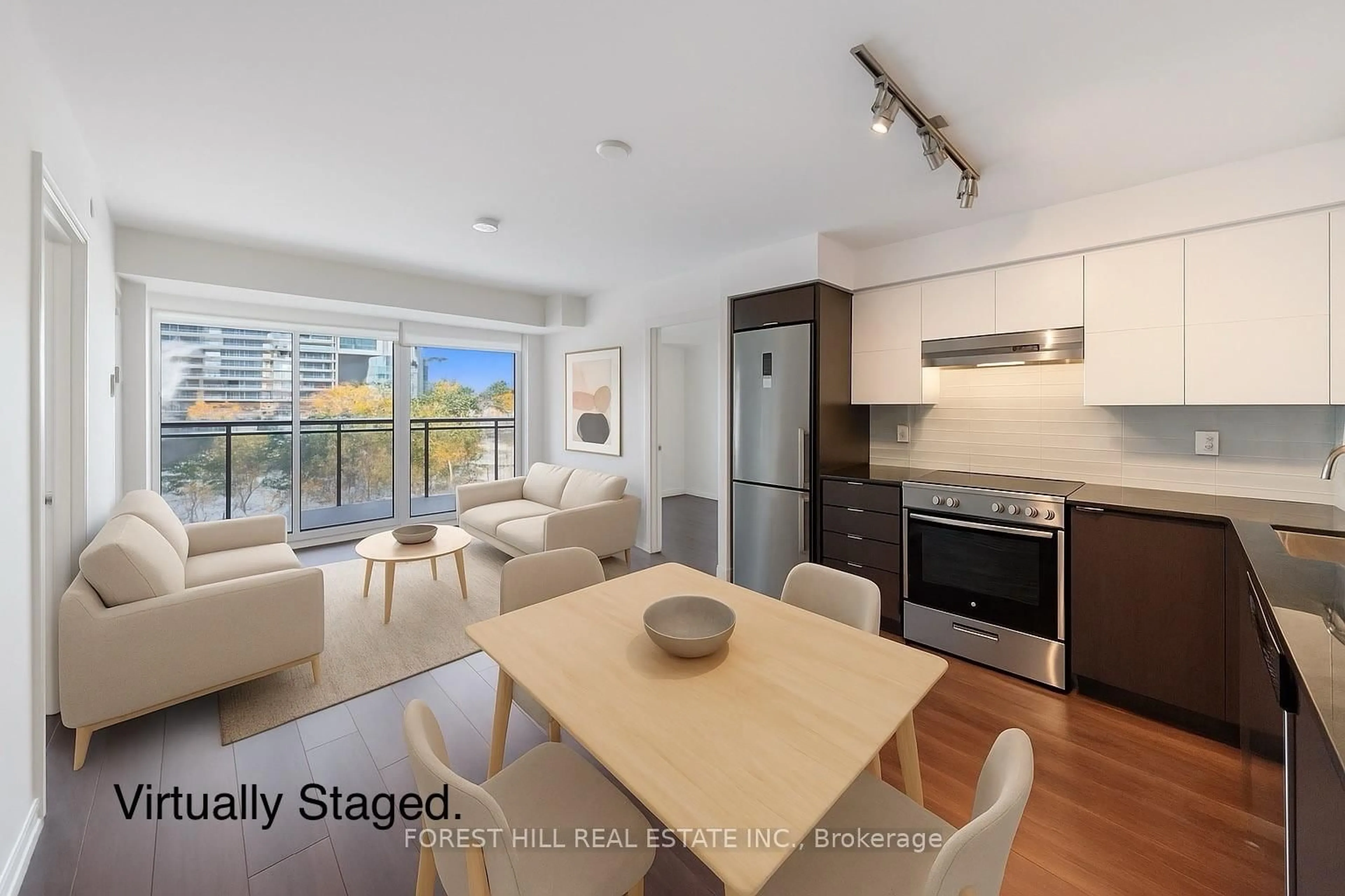 Open concept kitchen, wood/laminate floor for 120 Varna Dr #423, Toronto Ontario M6A 0B3