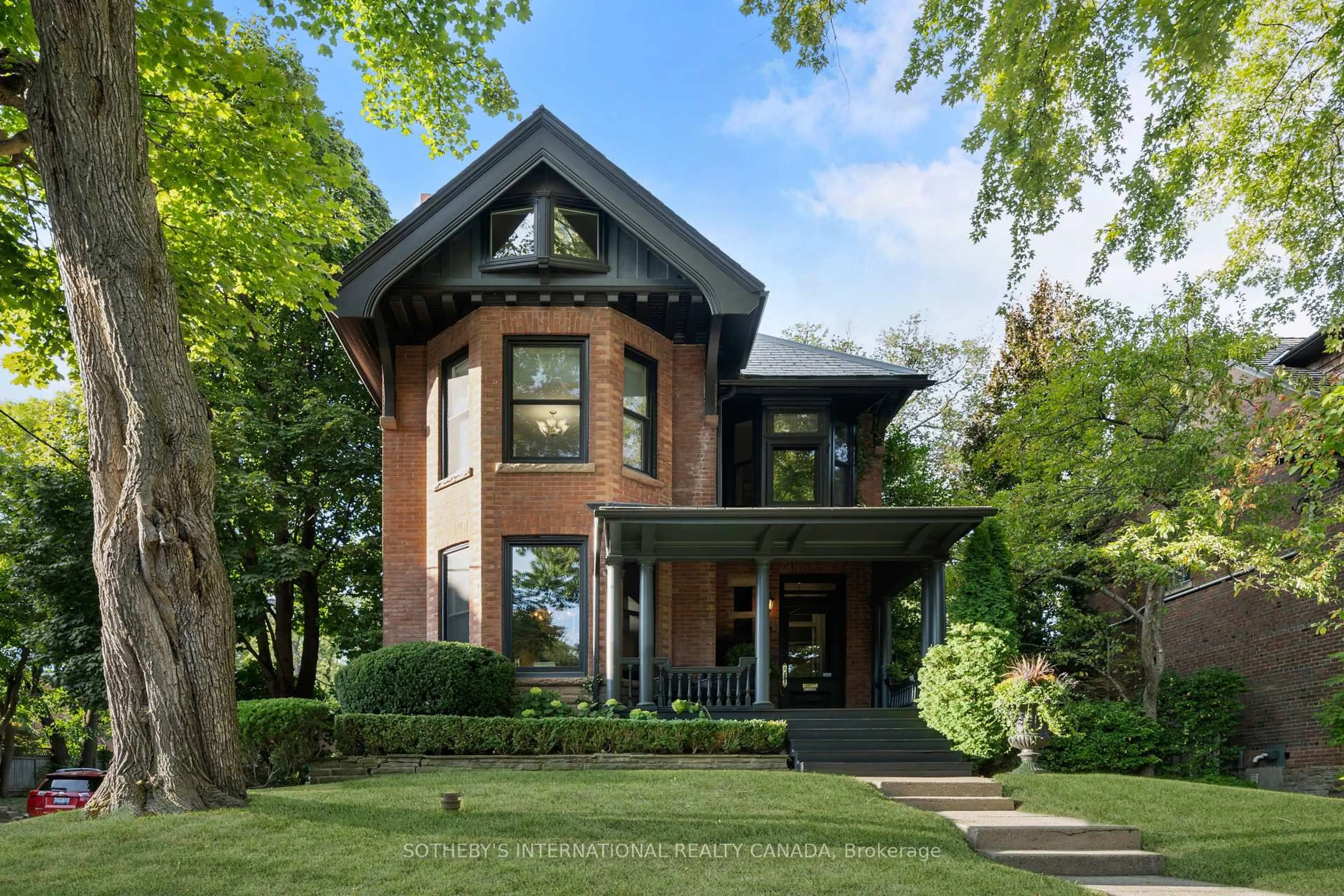 Home with brick exterior material, street for 92 Woodlawn Ave, Toronto Ontario M4V 1G7