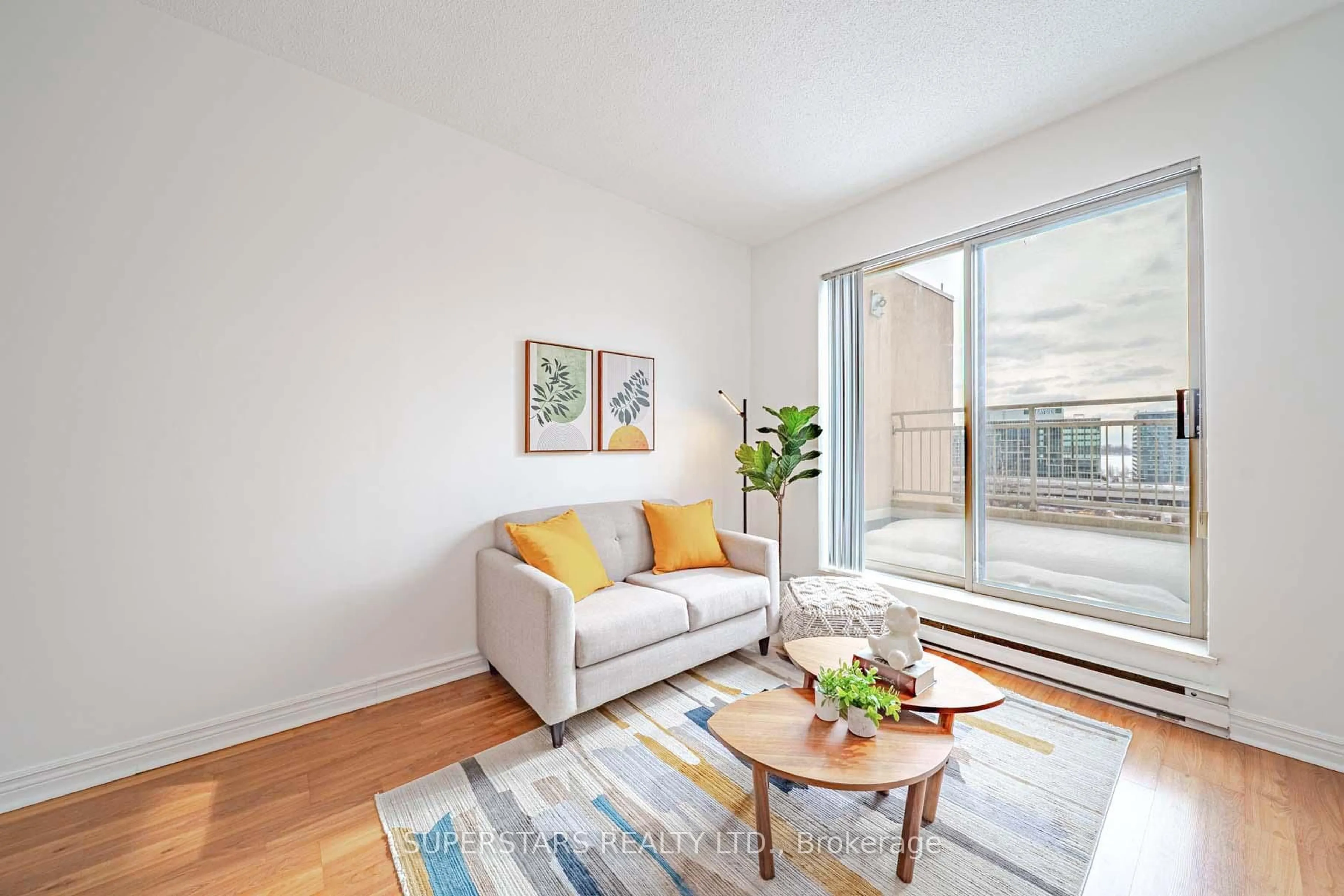 Living room with furniture, wood/laminate floor for 65 Scadding Ave #PH16, Toronto Ontario M5A 4L1