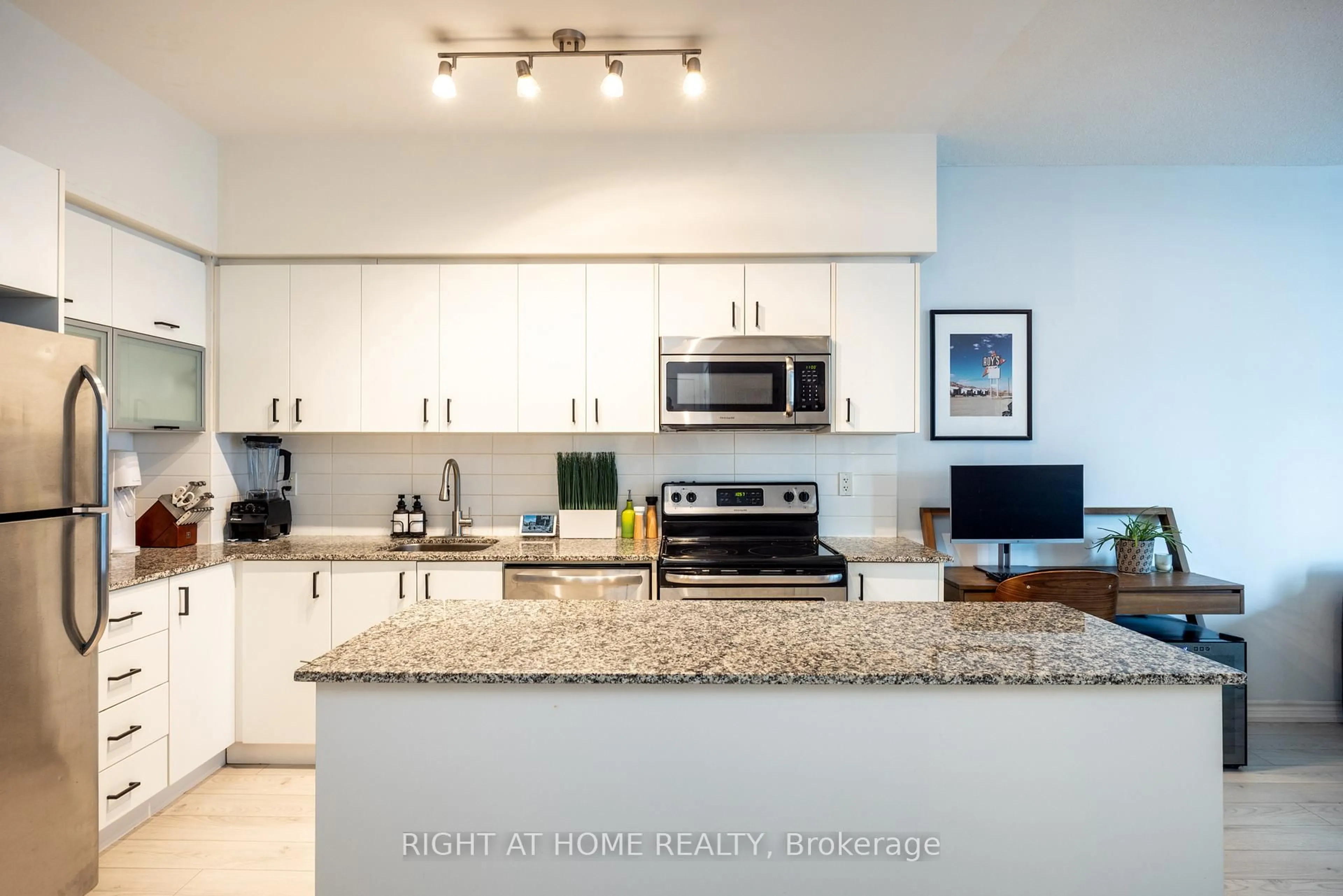 Open concept kitchen, ceramic/tile floor for 55 East Liberty St #615, Toronto Ontario M6K 3P9