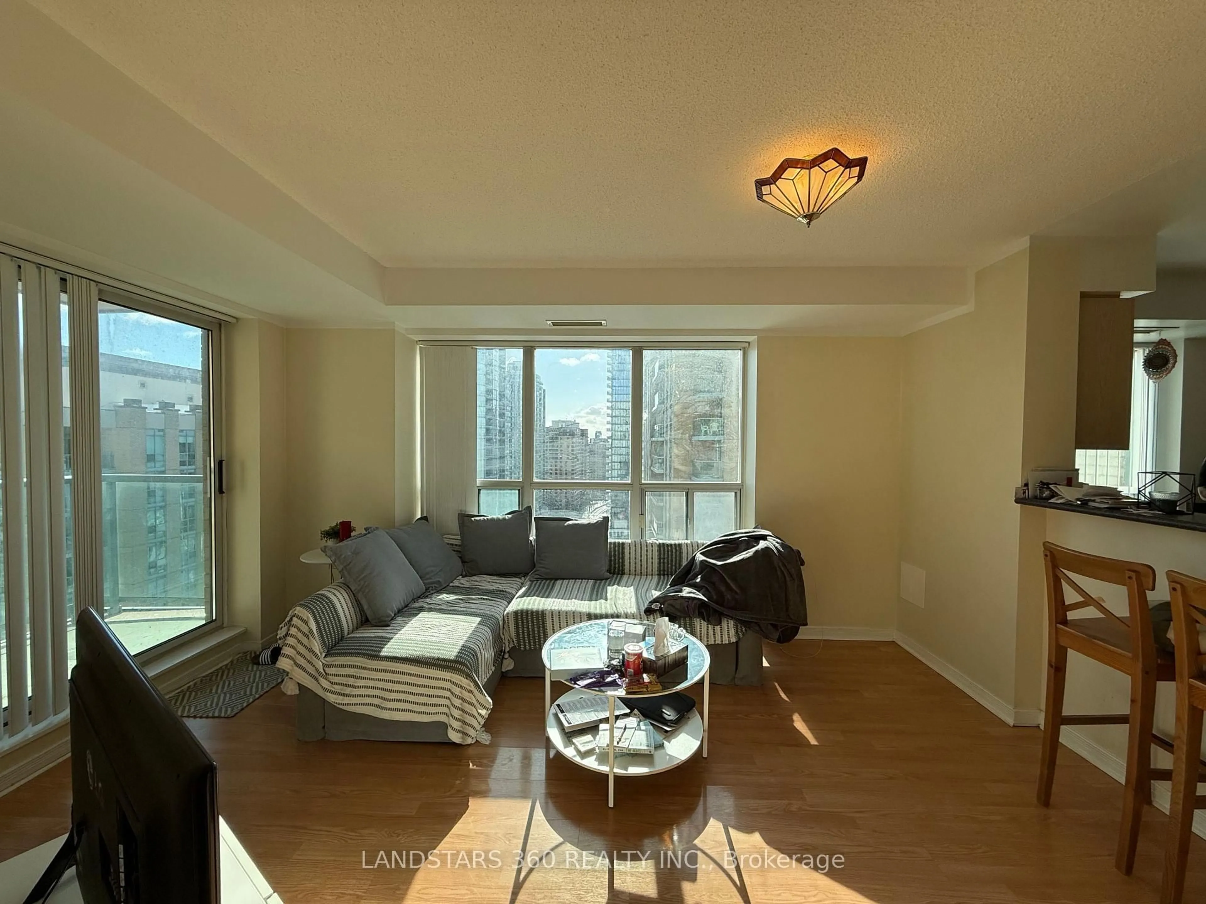 Living room with furniture, wood/laminate floor for 22 Olive Ave #1909, Toronto Ontario M2N 7G6