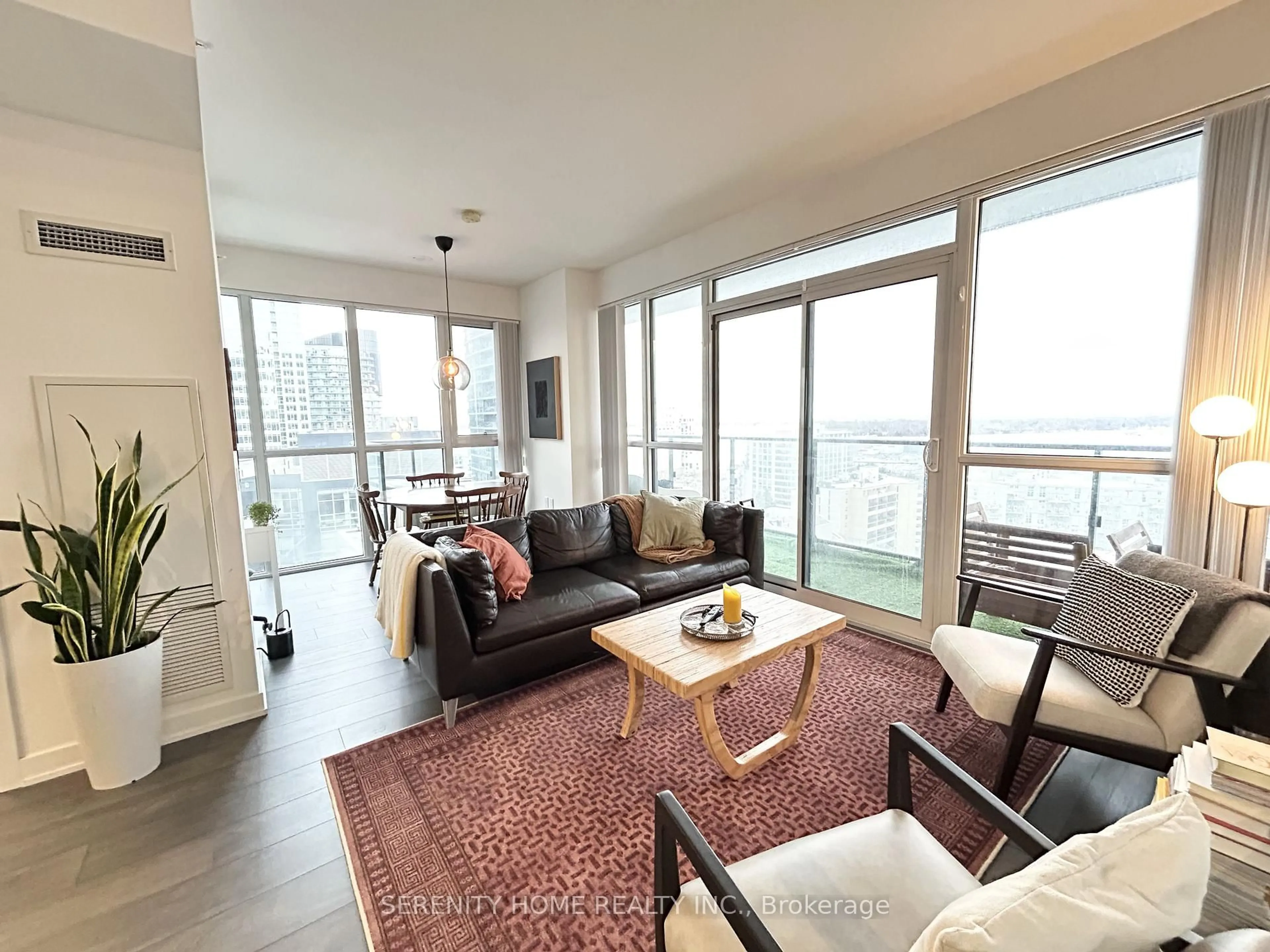Living room with furniture, wood/laminate floor for 38 Iannuzi St #2010, Toronto Ontario M5V 0S2