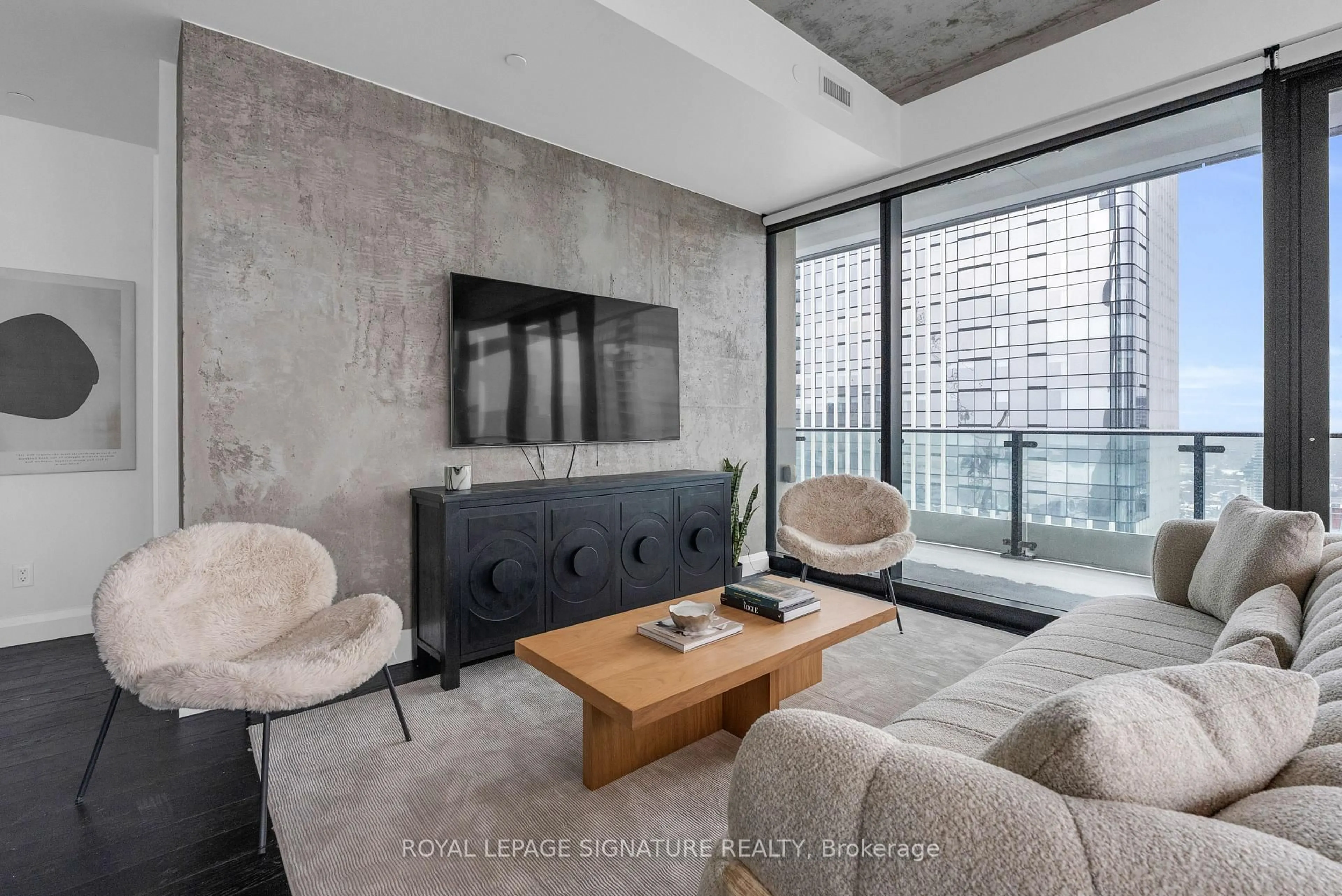 Living room with furniture, cement floor for 224 King St #4002, Toronto Ontario M5V 1H8