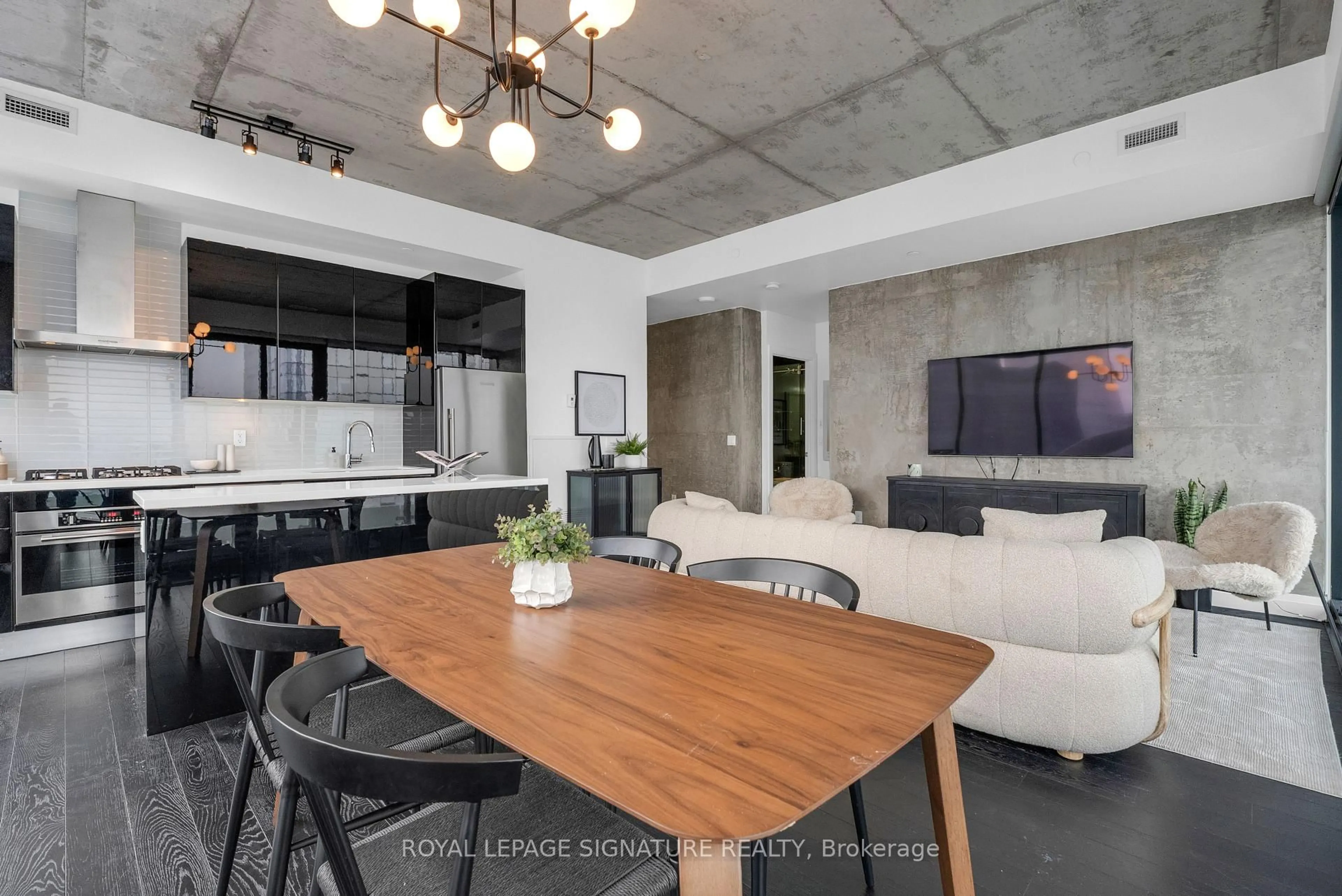 Open concept kitchen, cement floor for 224 King St #4002, Toronto Ontario M5V 1H8
