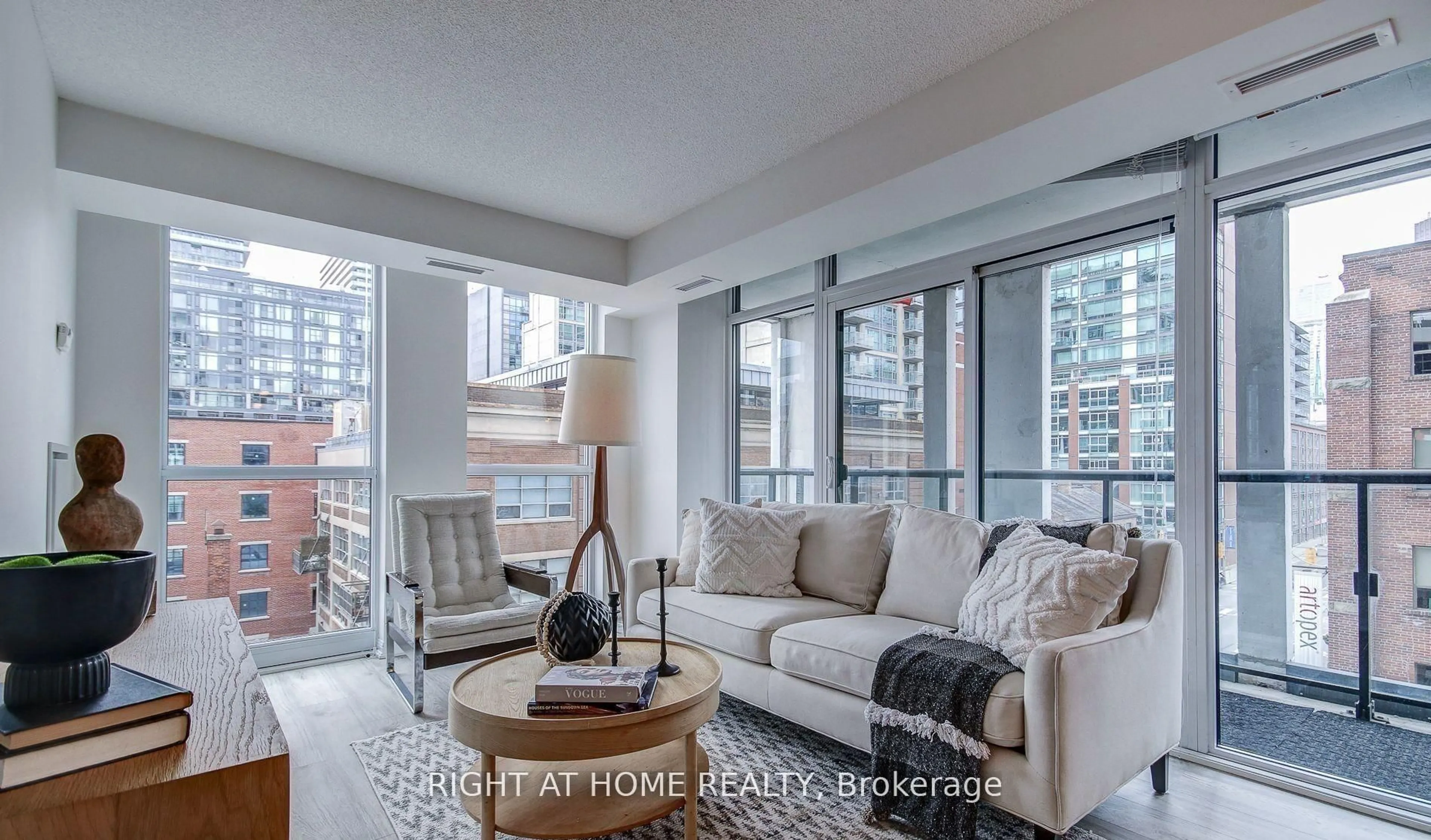 Living room with furniture, unknown for 400 Adelaide St #606, Toronto Ontario M5A 4S3