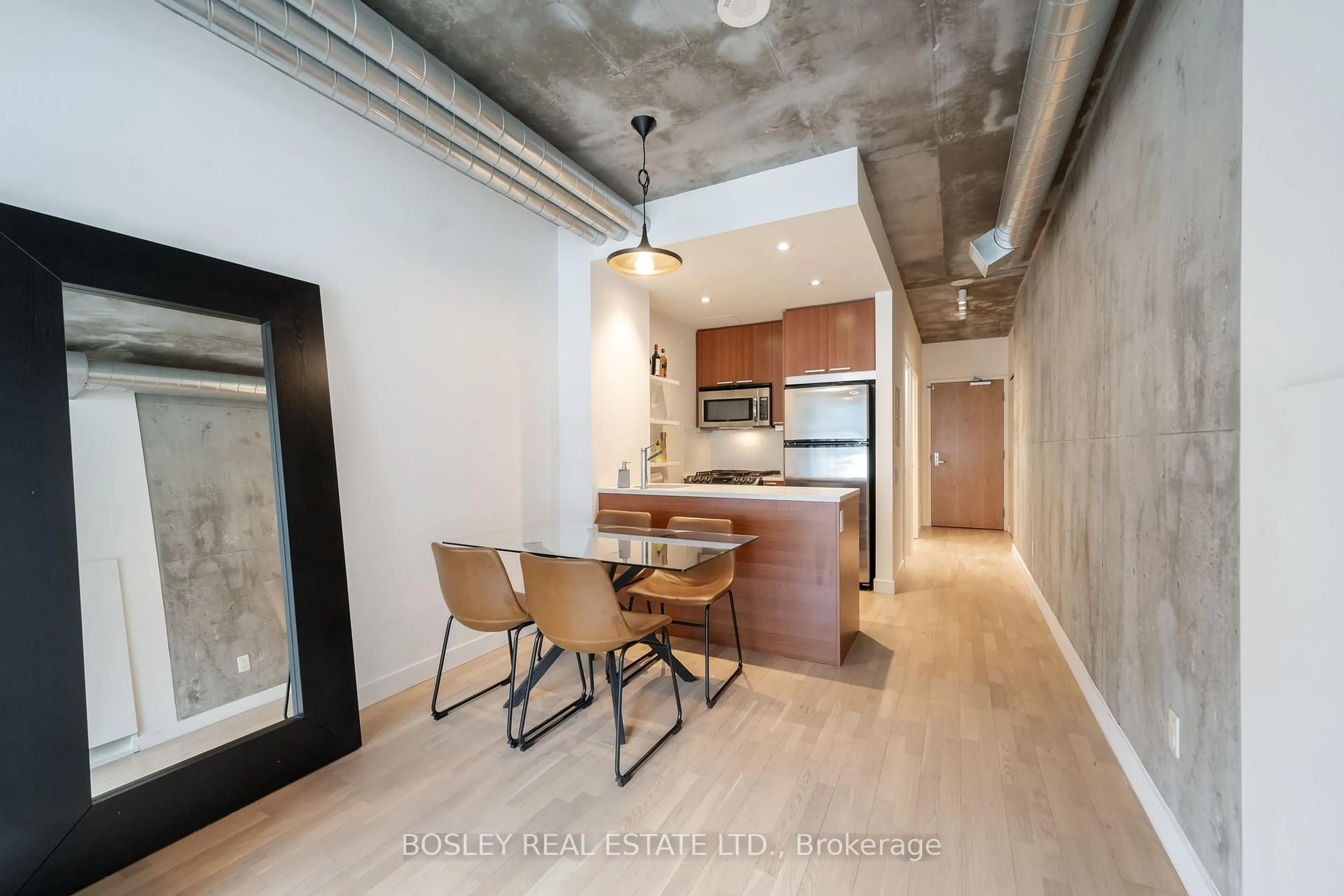 Open concept kitchen, cement floor for 138 Princess St #409, Toronto Ontario M5A 0B1