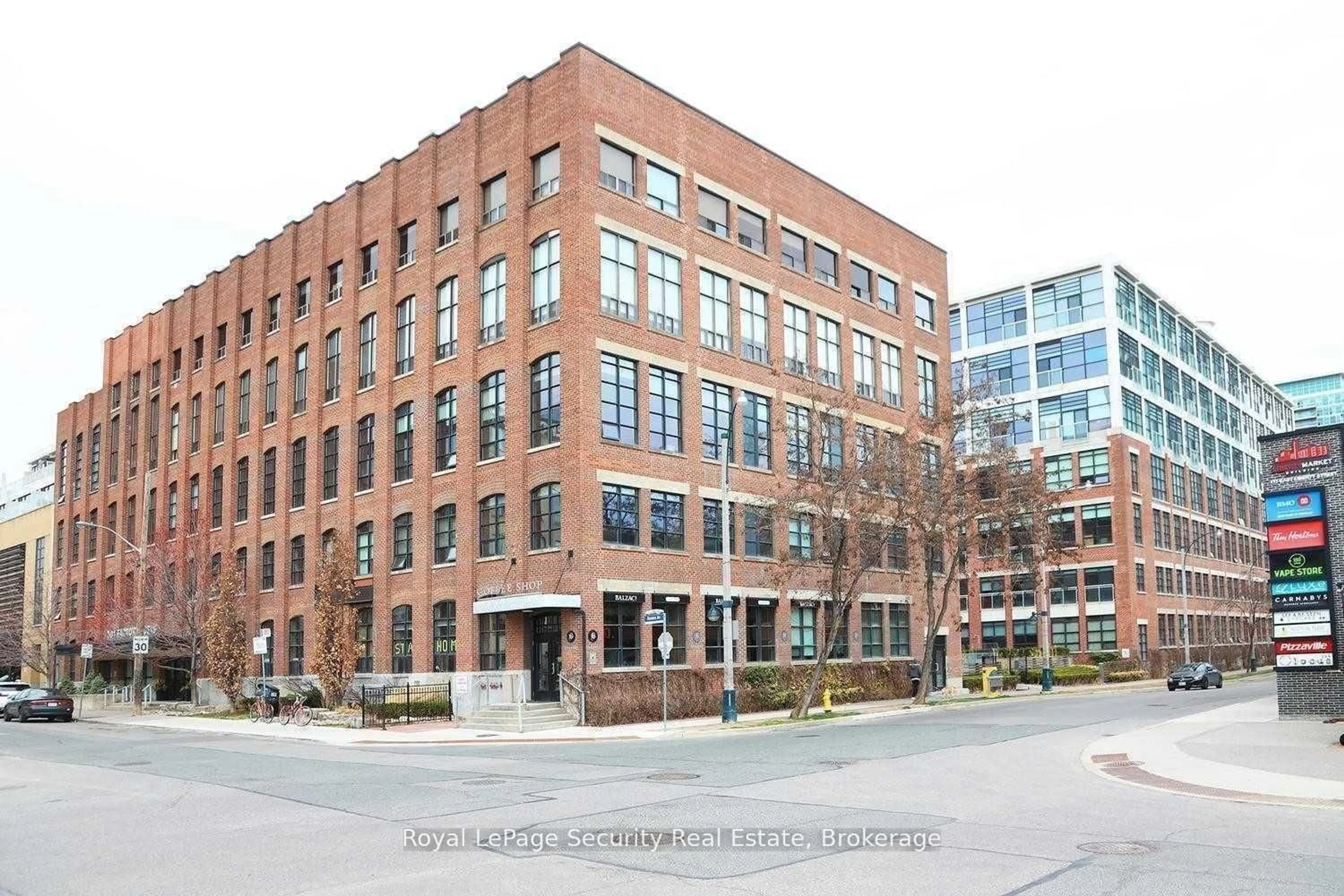 Home with brick exterior material, building for 43 Hanna Ave #208, Toronto Ontario M6K 1X1