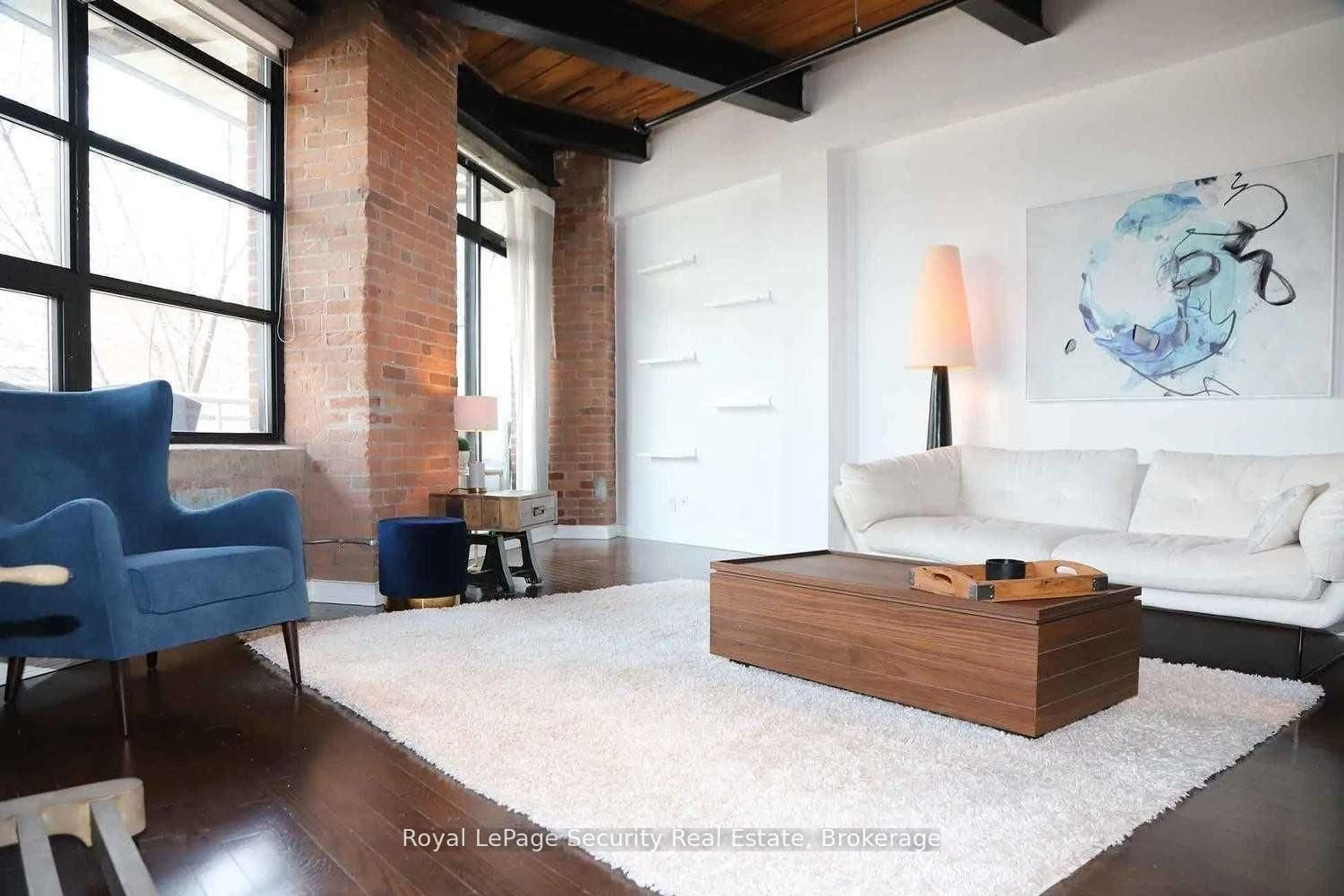 Living room with furniture, unknown for 43 Hanna Ave #208, Toronto Ontario M6K 1X1