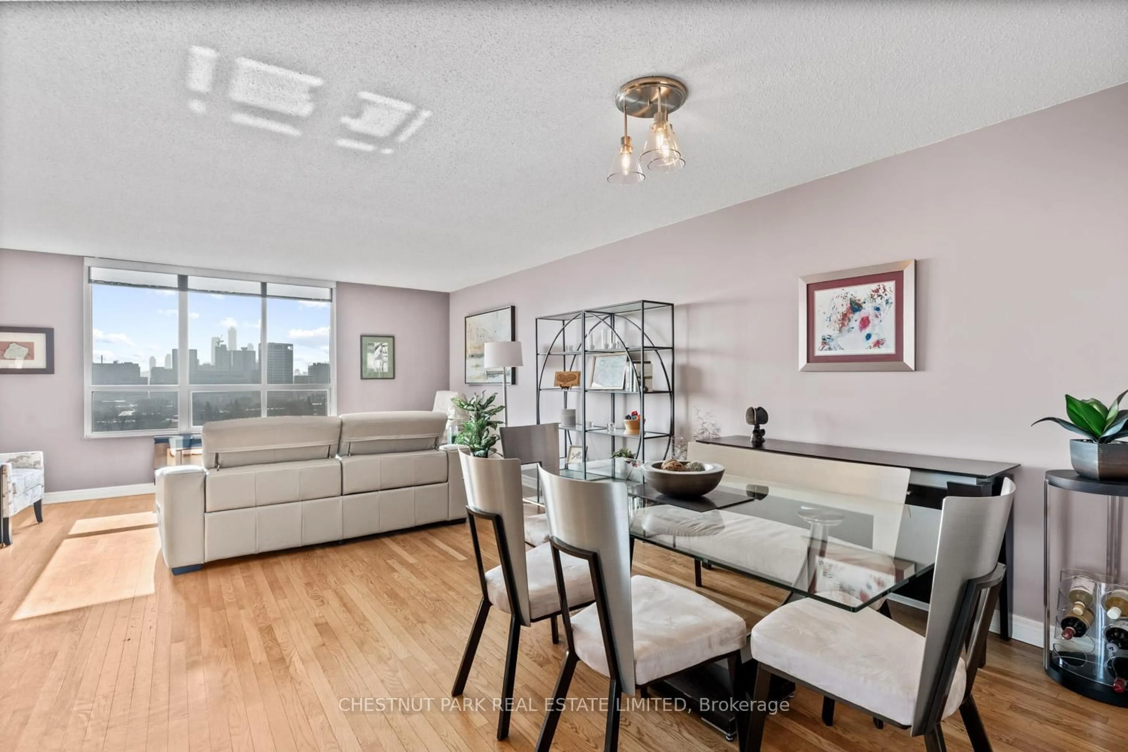 Living room with furniture, wood/laminate floor for 35 Merton St #1606, Toronto Ontario M4S 3G4