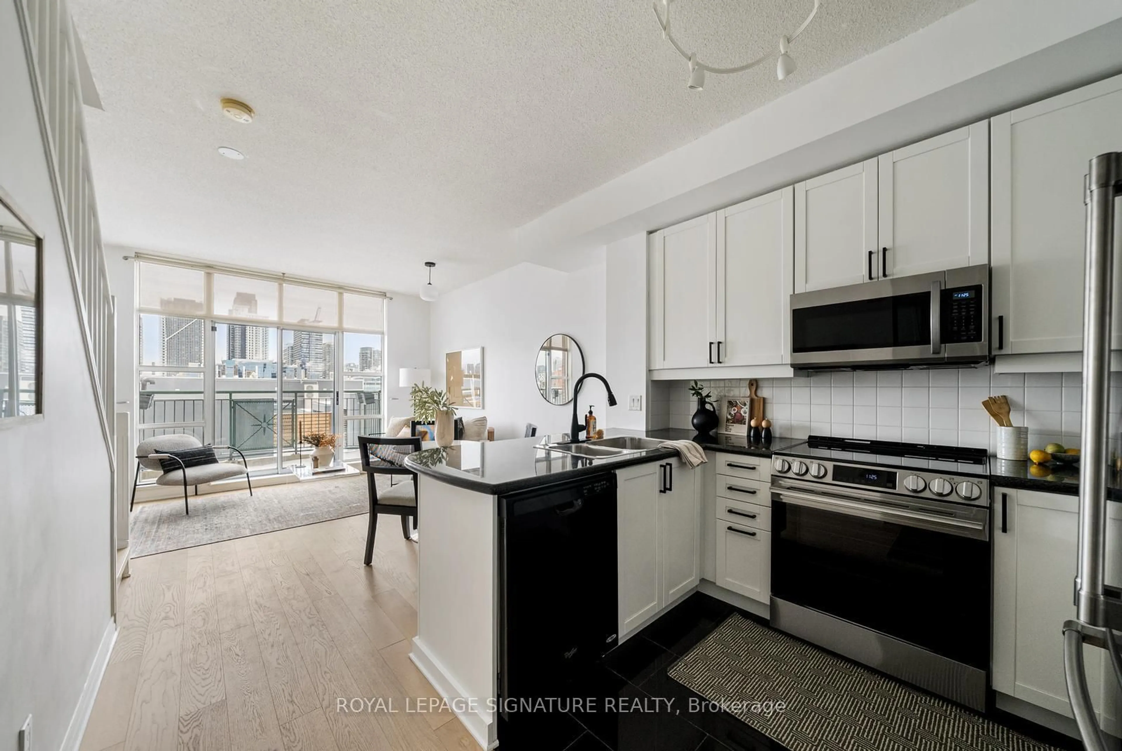 Open concept kitchen, unknown for 901 Queen St #PH 612, Toronto Ontario M6J 3X4