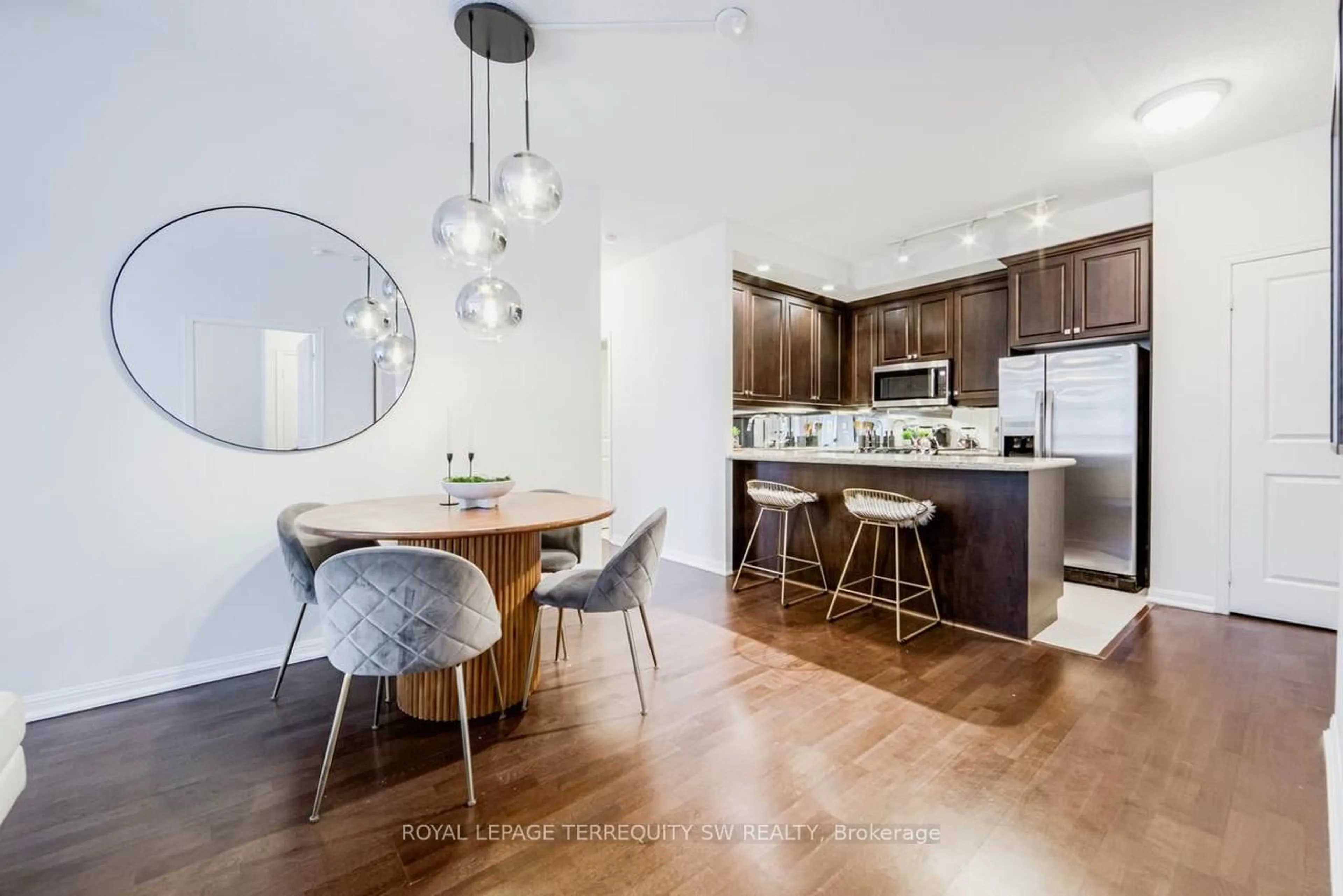 Open concept kitchen, wood/laminate floor for 21 Grand Magazine St #1201, Toronto Ontario M5V 1B5