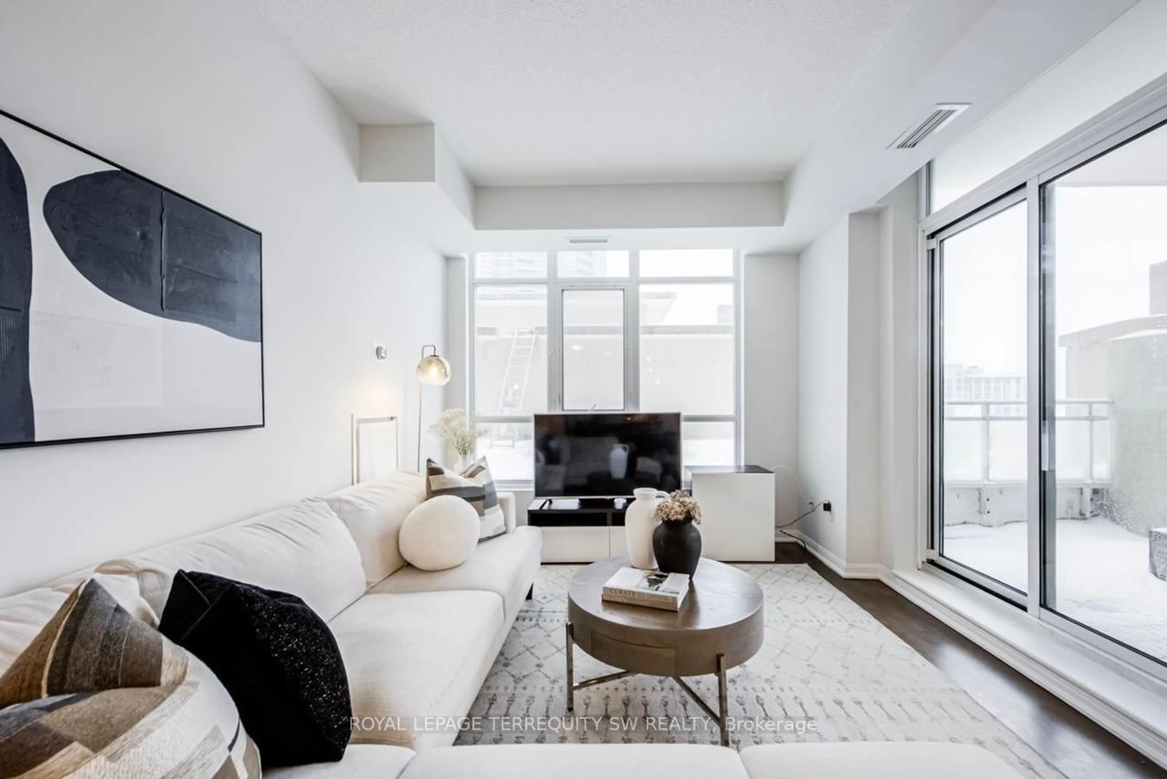 Living room with furniture, unknown for 21 Grand Magazine St #1201, Toronto Ontario M5V 1B5