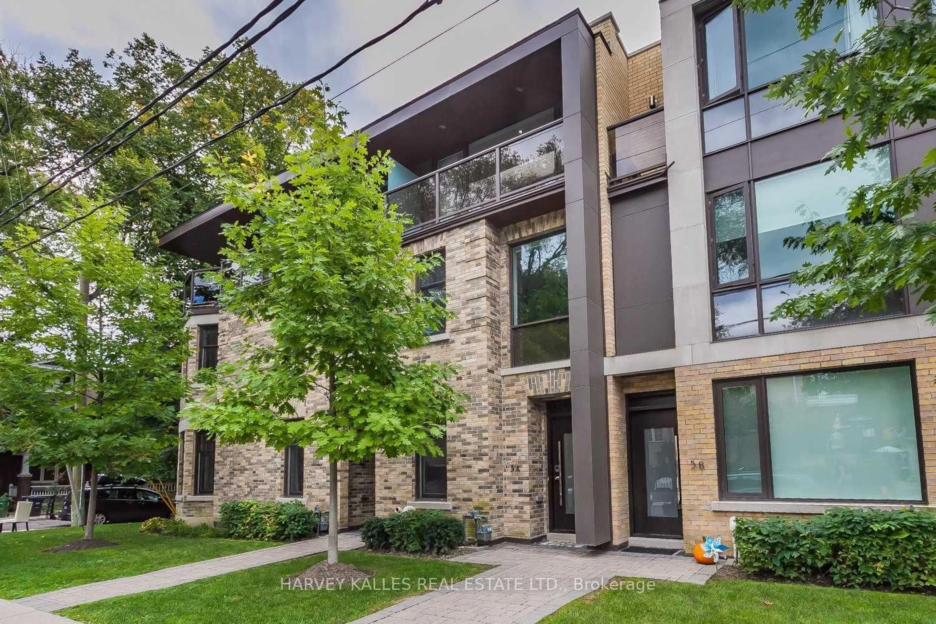 Home with brick exterior material, street for 5A Sylvan Ave, Toronto Ontario M6H 1G2