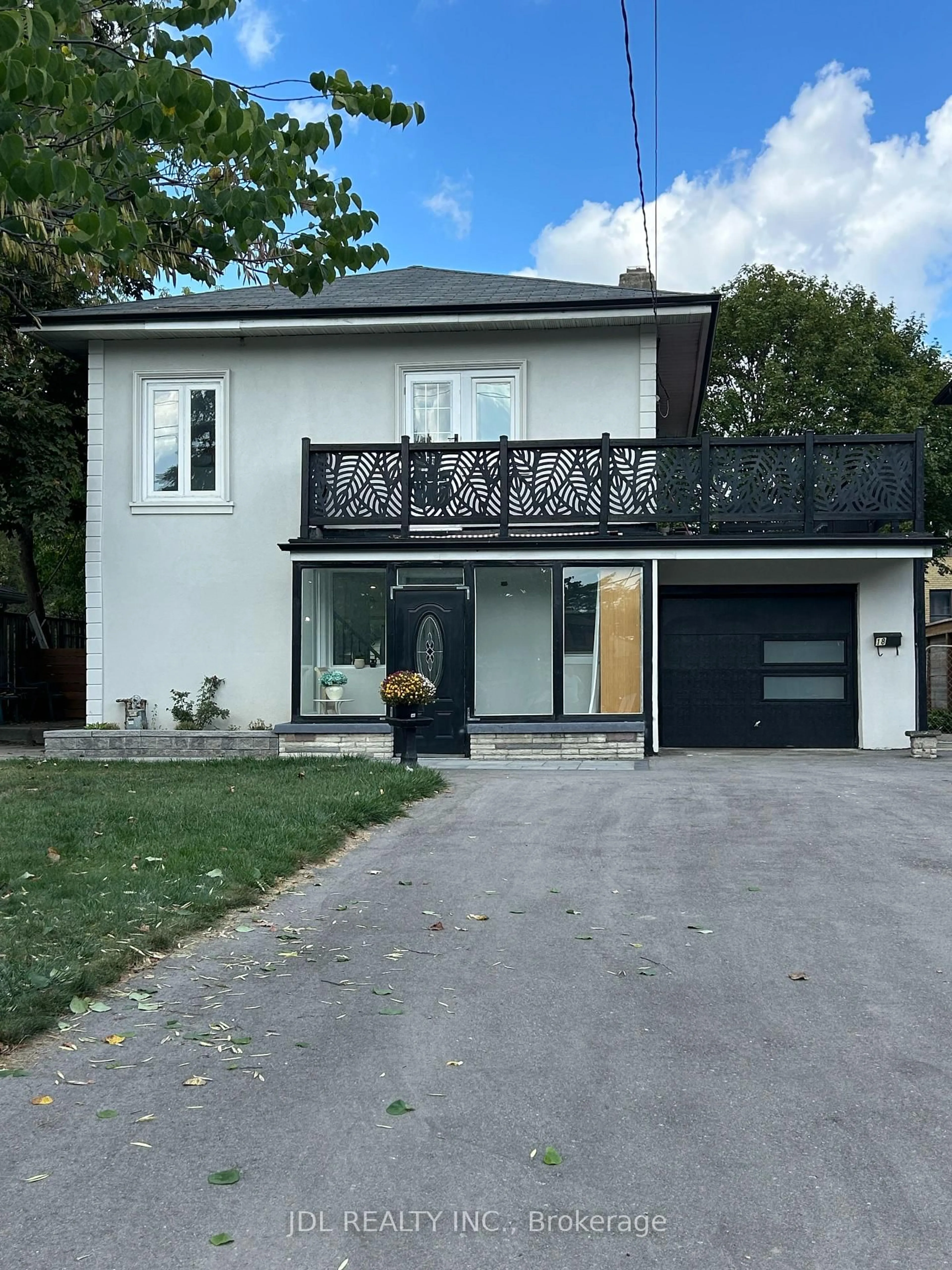 Home with vinyl exterior material, street for 18 Cadillac Ave Ave, Toronto Ontario M3H 1R9