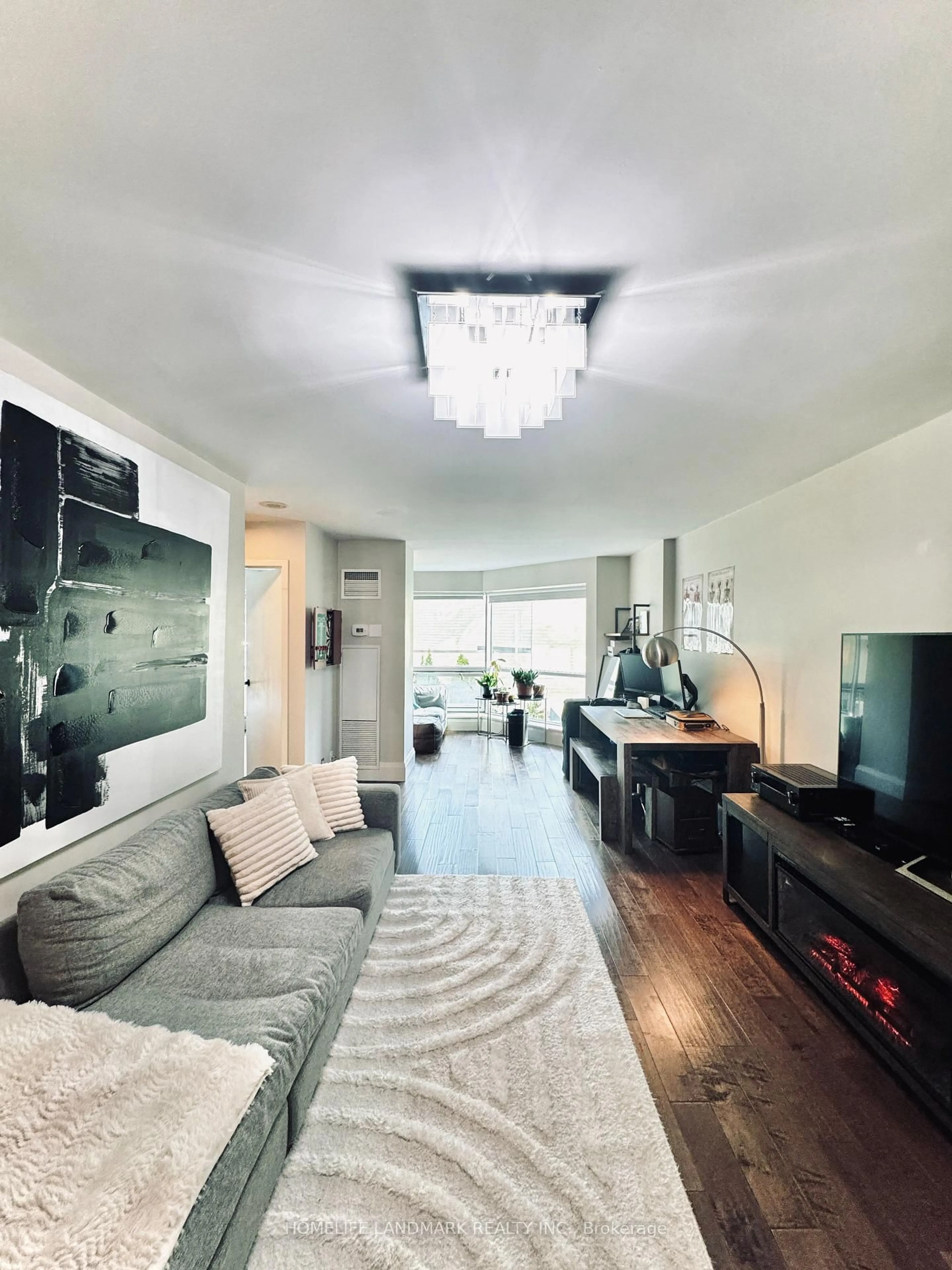 Living room with furniture, wood/laminate floor for 10 Queens Quay #408, Toronto Ontario M5J 2R9