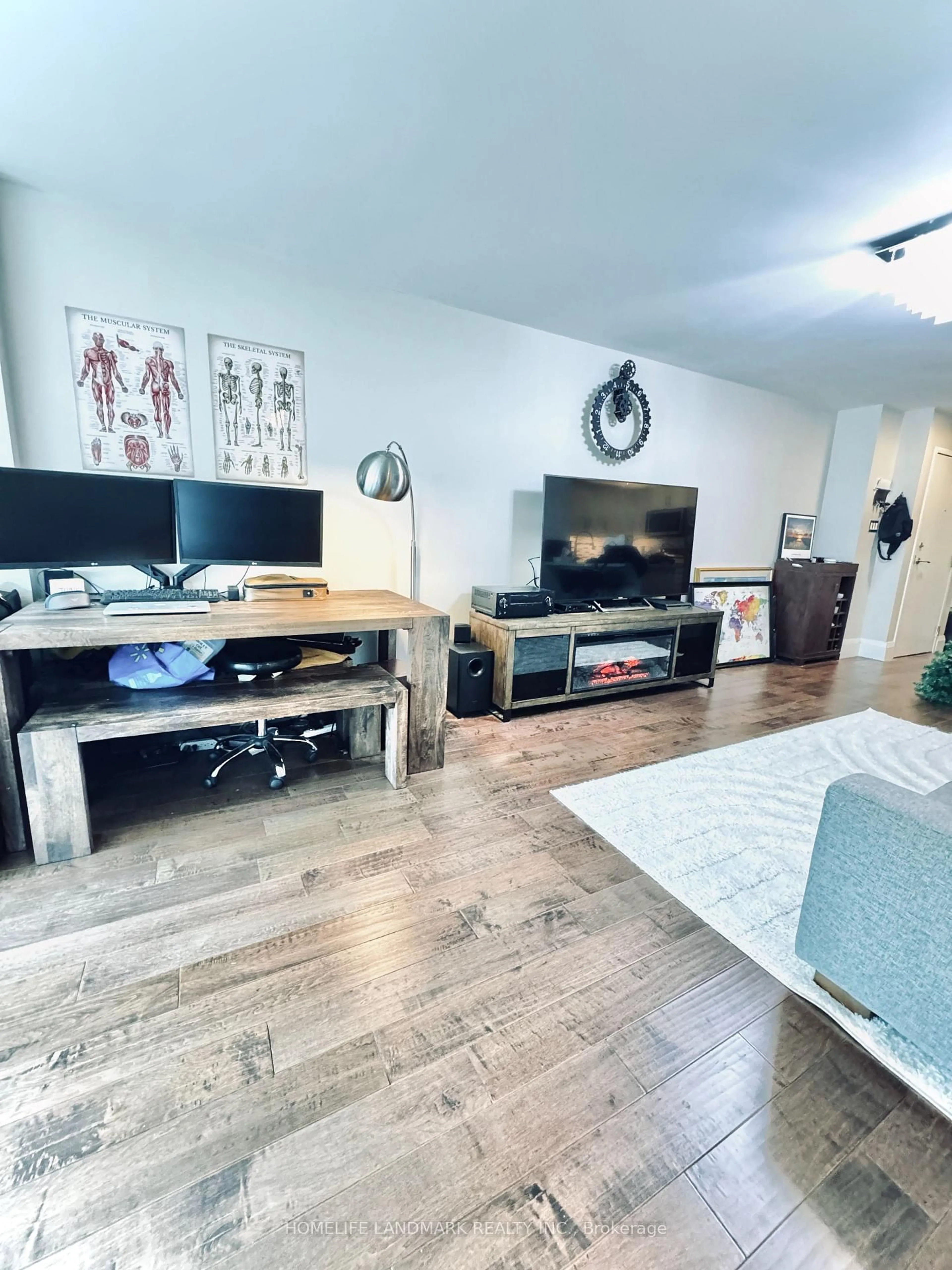 Living room with furniture, wood/laminate floor for 10 Queens Quay #408, Toronto Ontario M5J 2R9