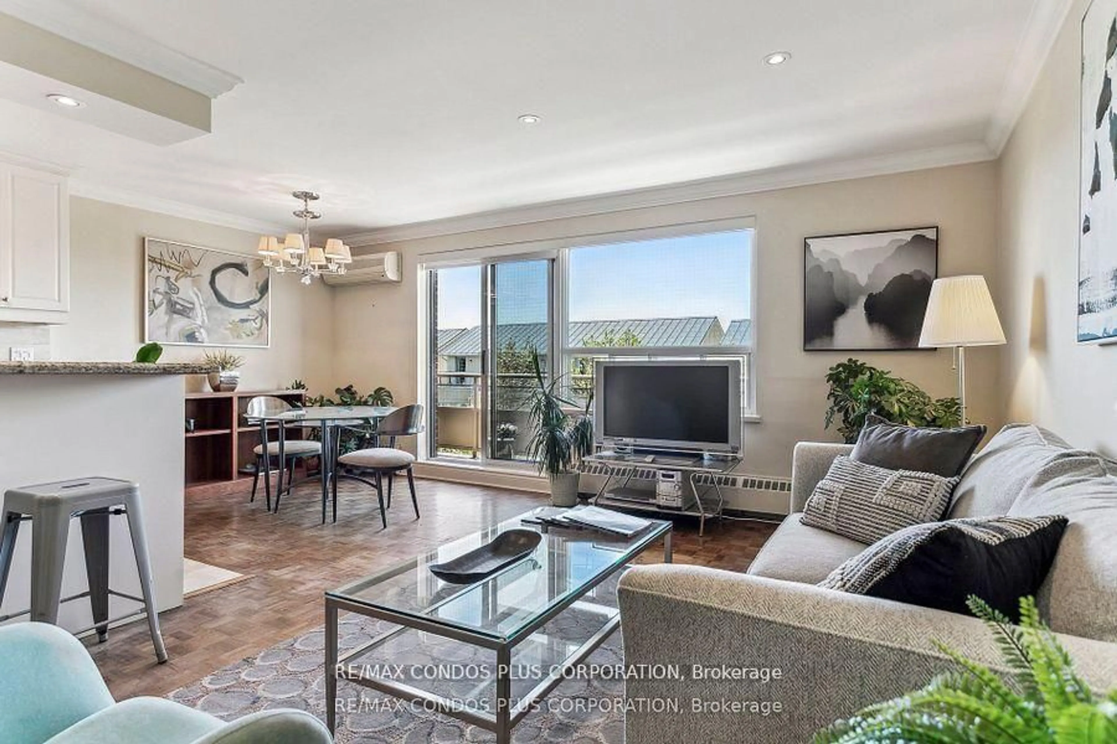 Living room with furniture, unknown for 71 Jonesville Cres #409, Toronto Ontario M4A 1H1