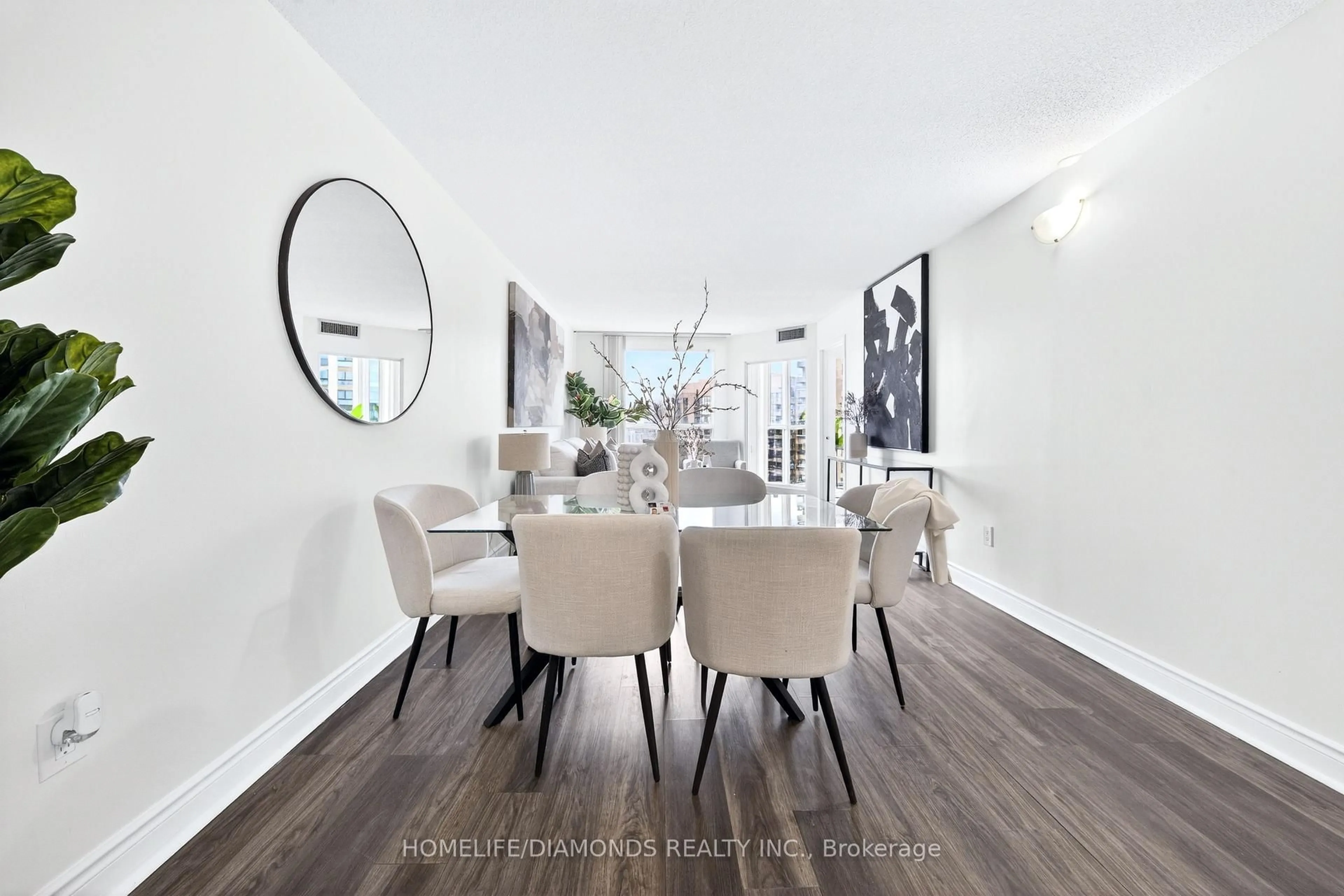 Dining room, wood/laminate floor for 5 CONCORDE Pl #2002, Toronto Ontario M3C 3M8