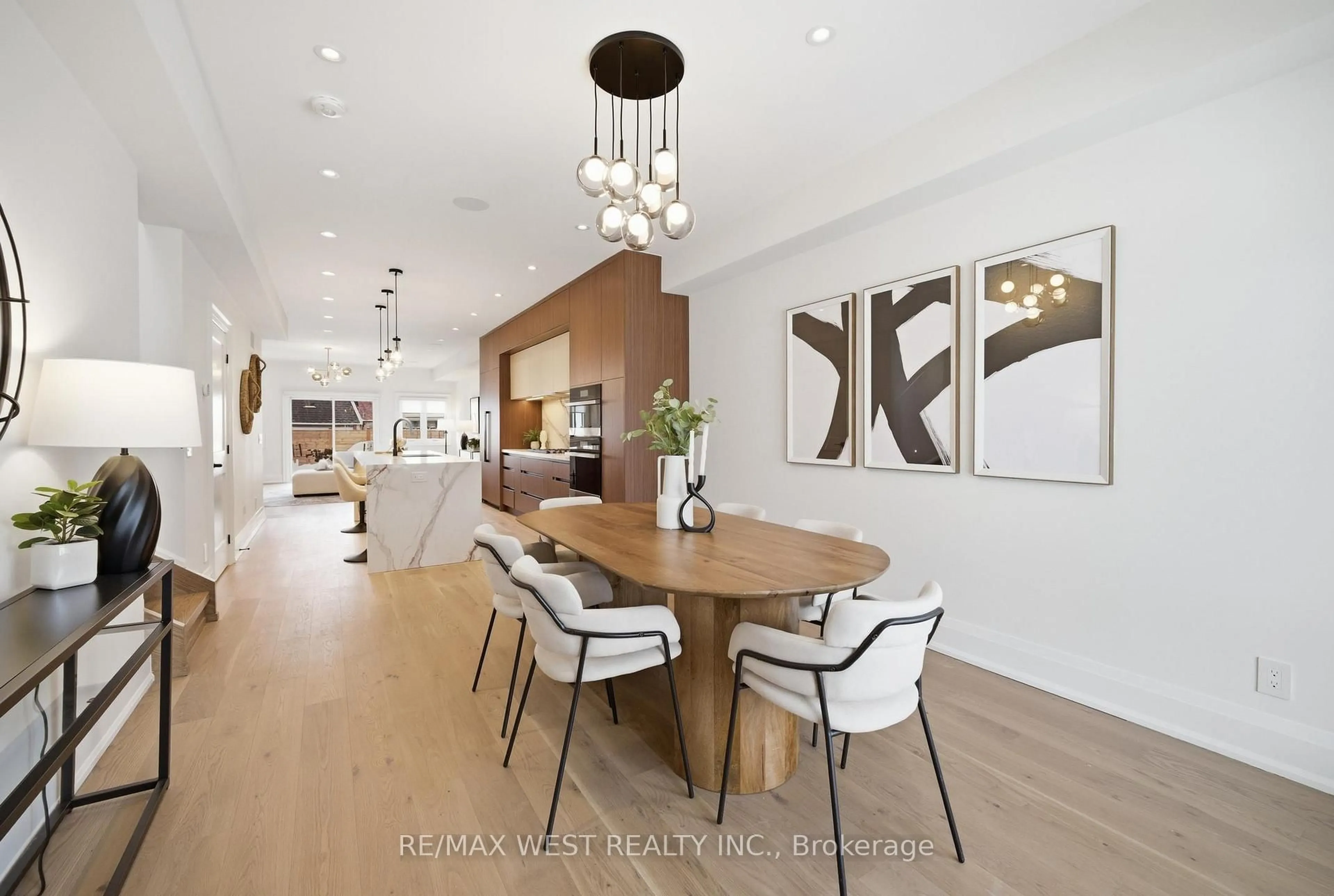 Dining room, wood/laminate floor for 390 St Clarens Ave, Toronto Ontario M6H 3W3