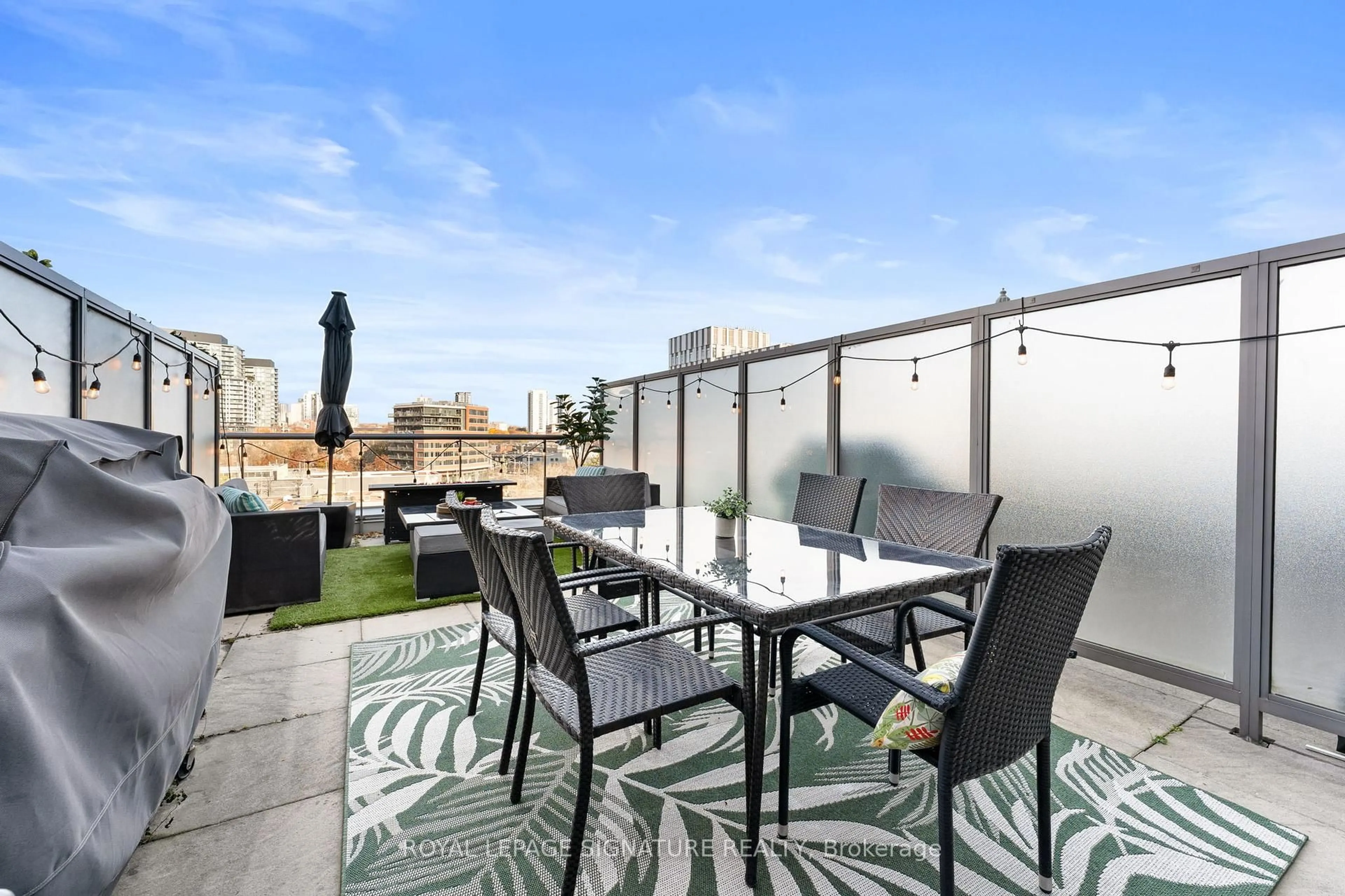 Patio, city buildings view from balcony for 33 Mill St #606, Toronto Ontario M5A 3R3