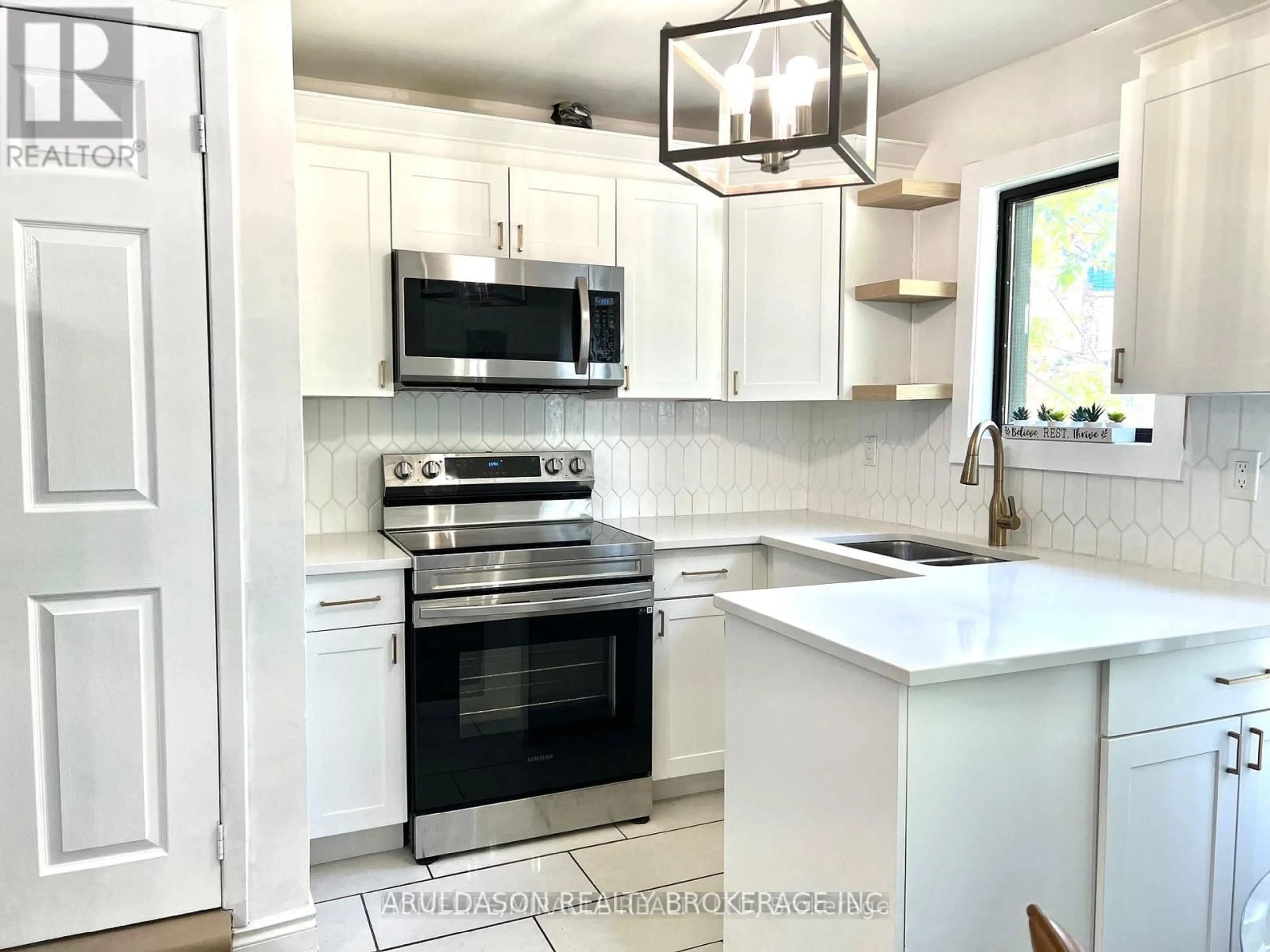 Open concept kitchen, ceramic/tile floor for 1 Givins St, Toronto Ontario M6J 2X5