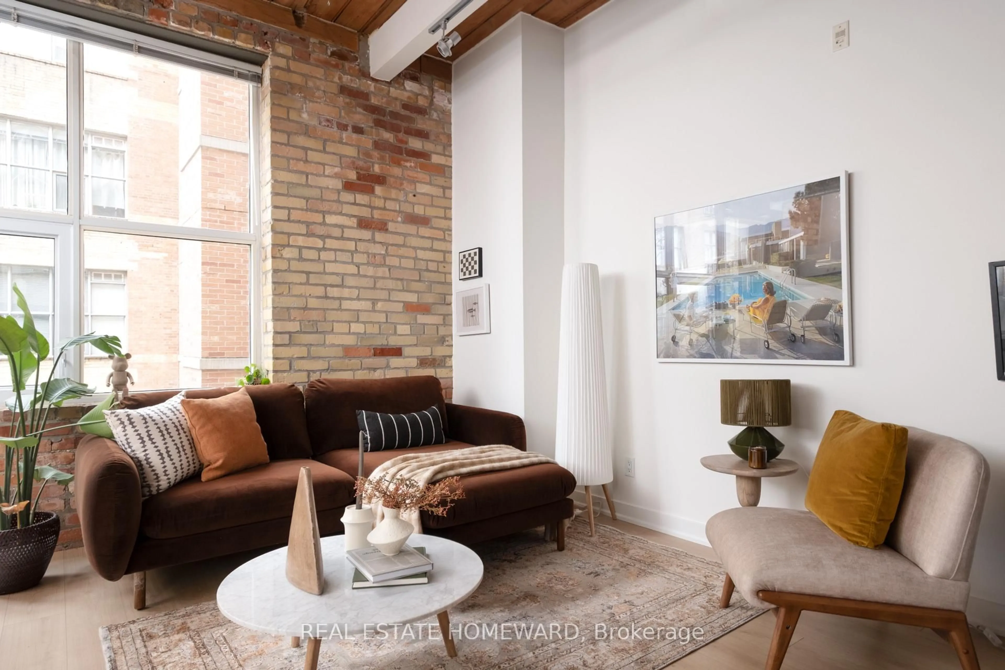 Living room with furniture, unknown for 955 Queen St #321, Toronto Ontario M6J 3X5