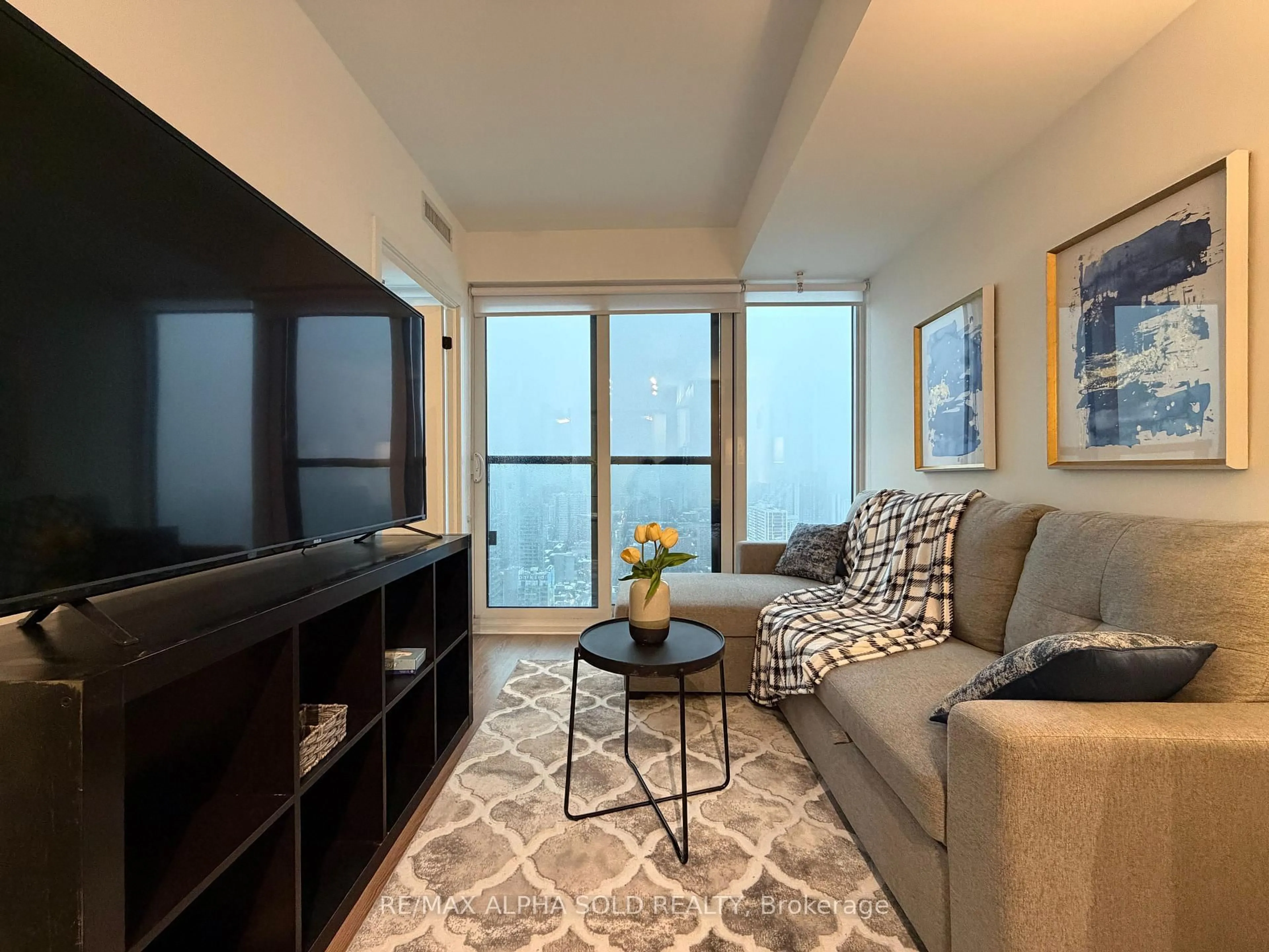 Living room with furniture, unknown for 319 Jarvis St #4808, Toronto Ontario M5B 0C8