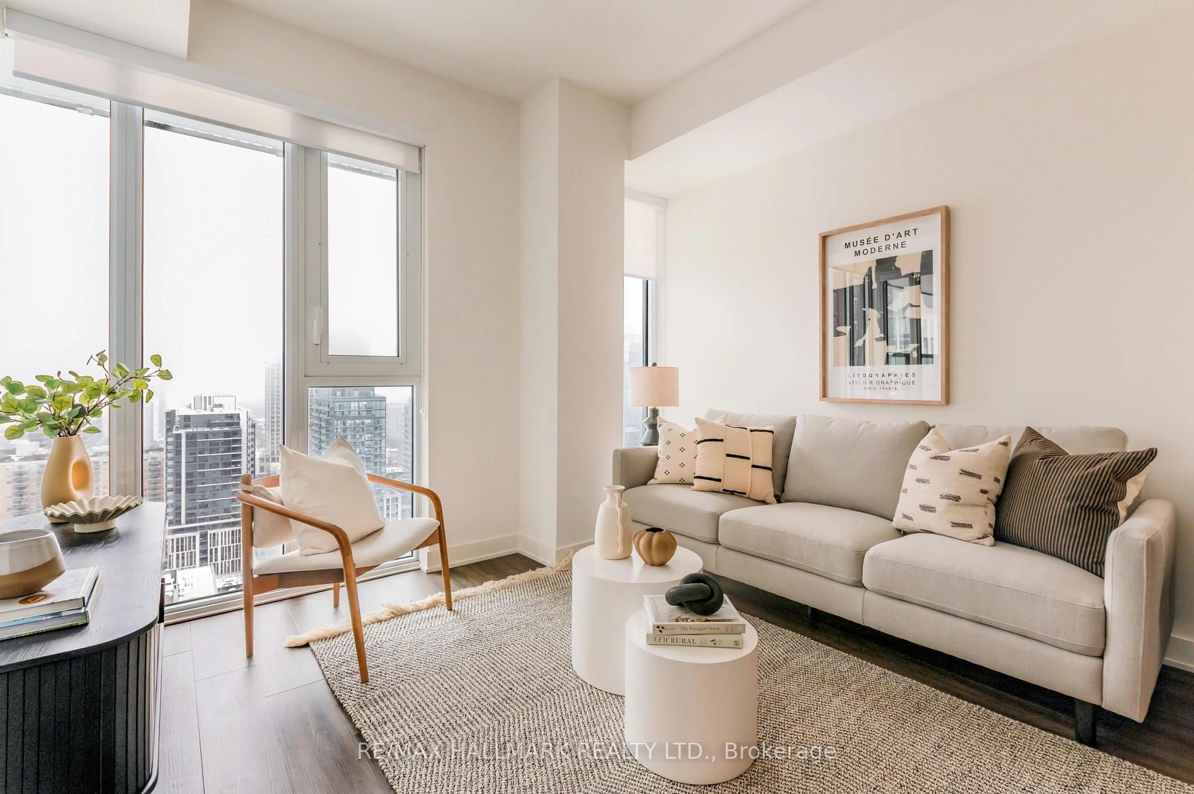 Living room with furniture, unknown for 70 Princess St #2401 E, Toronto Ontario M5A 0X6