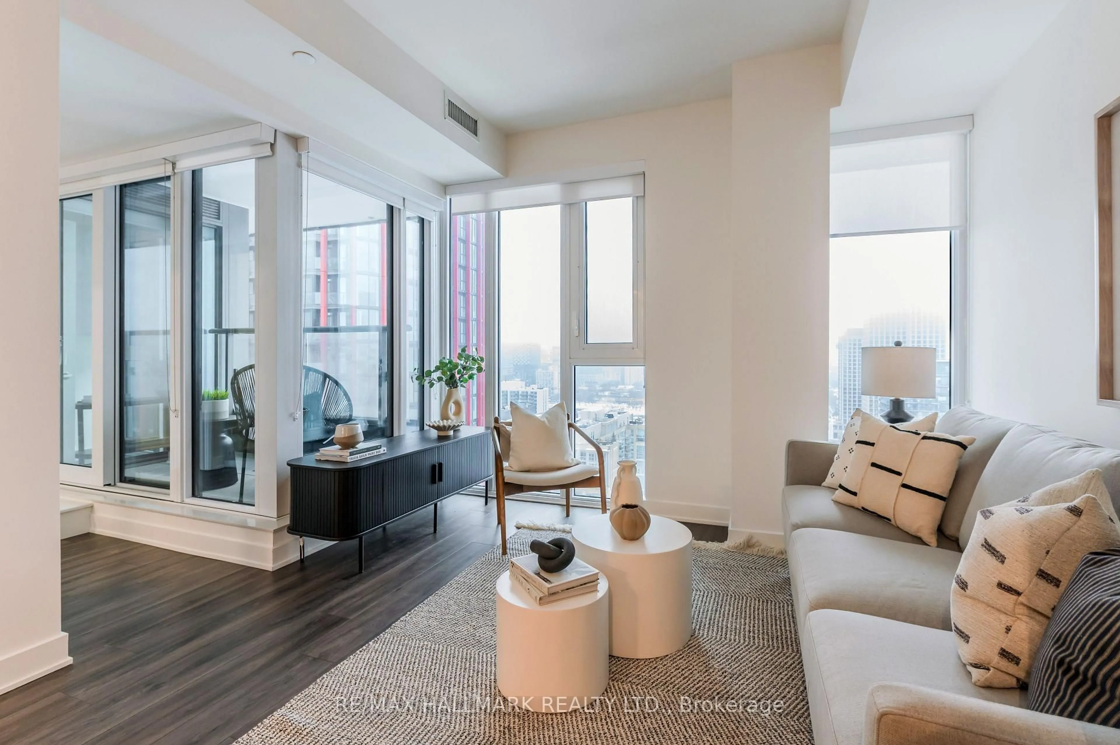 Living room with furniture, unknown for 70 Princess St #2401 E, Toronto Ontario M5A 0X6