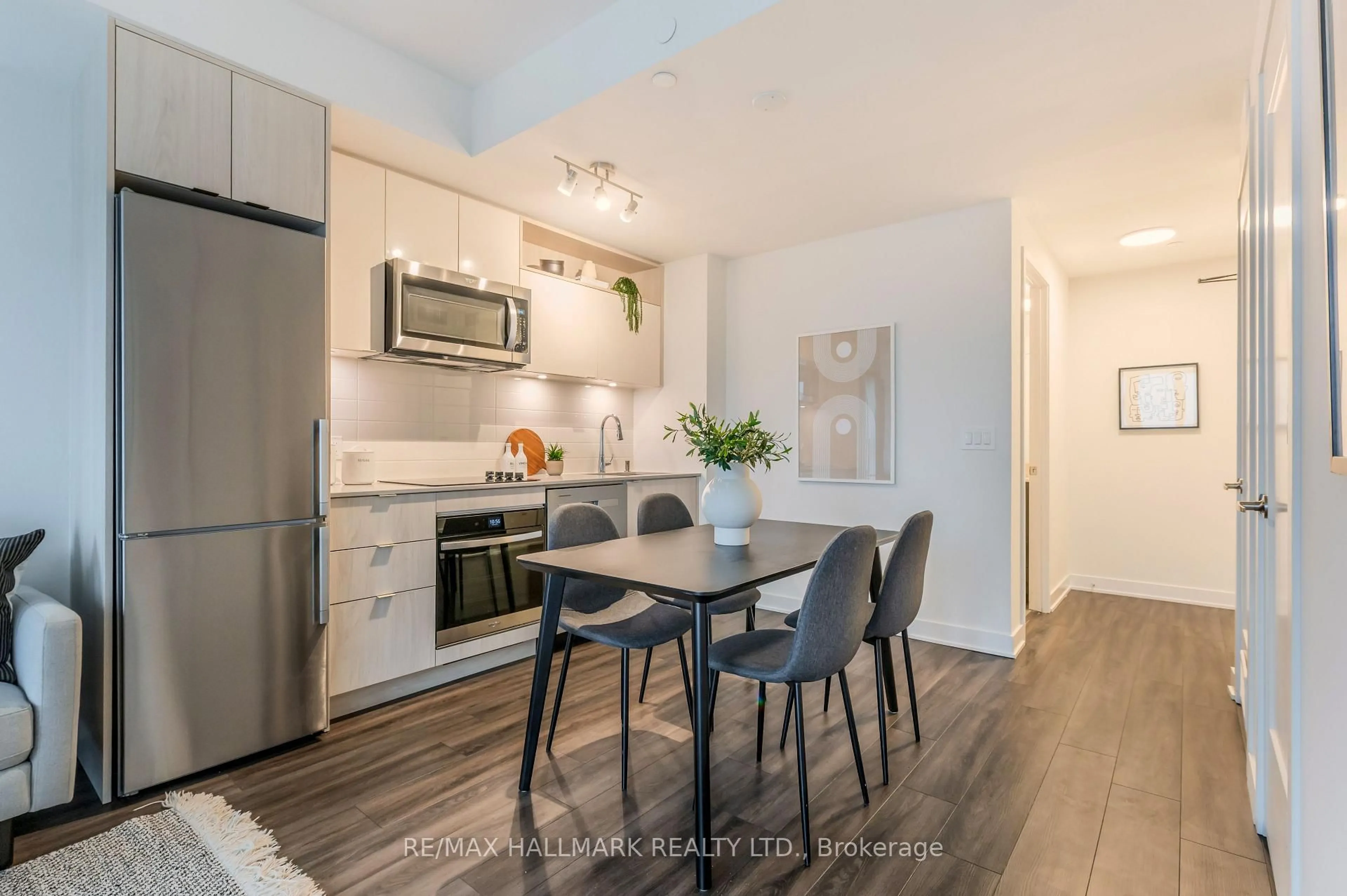 Open concept kitchen, wood/laminate floor for 70 Princess St #2401 E, Toronto Ontario M5A 0X6