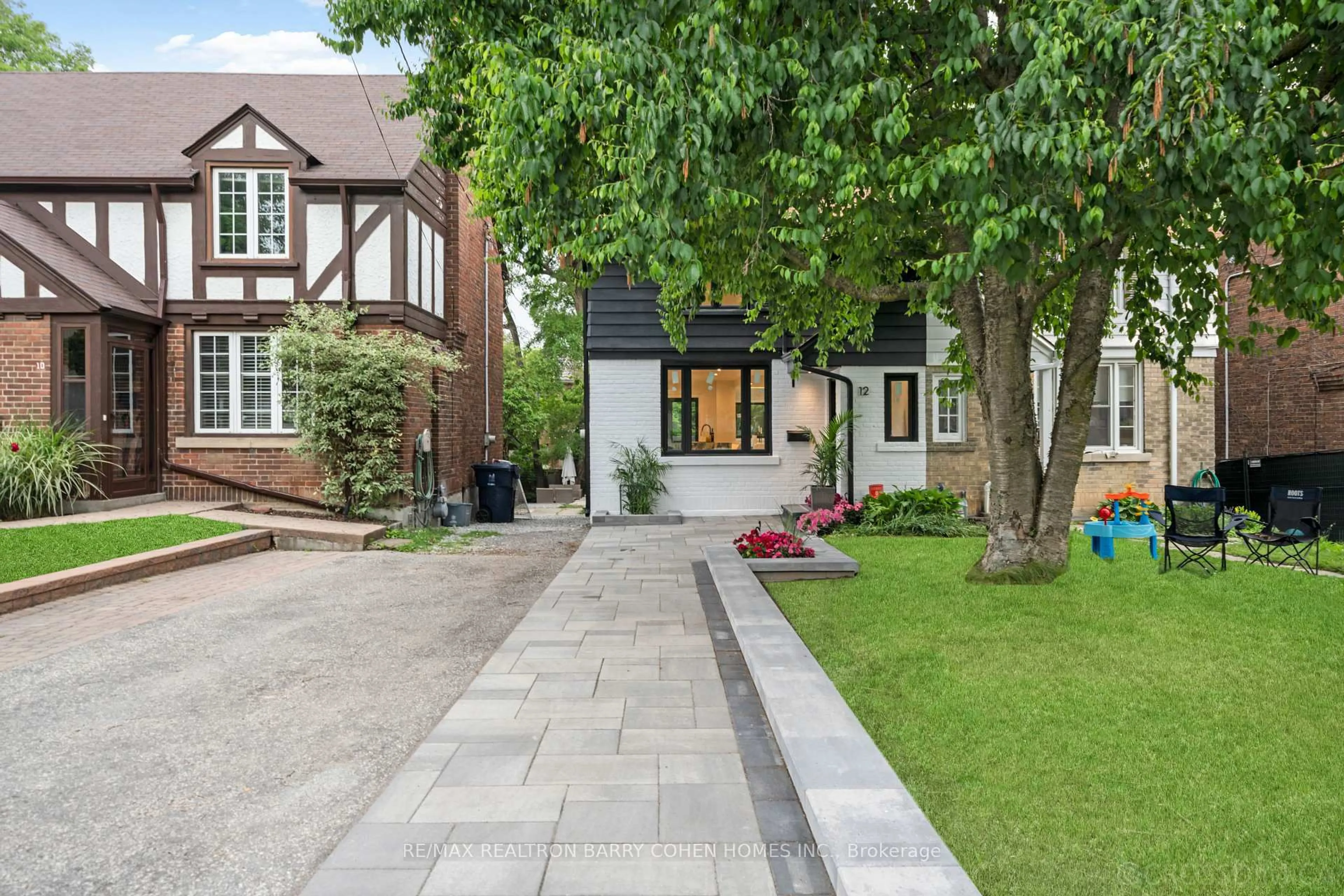 Home with brick exterior material, street for 12 Fairfield Rd, Toronto Ontario M4P 1T1