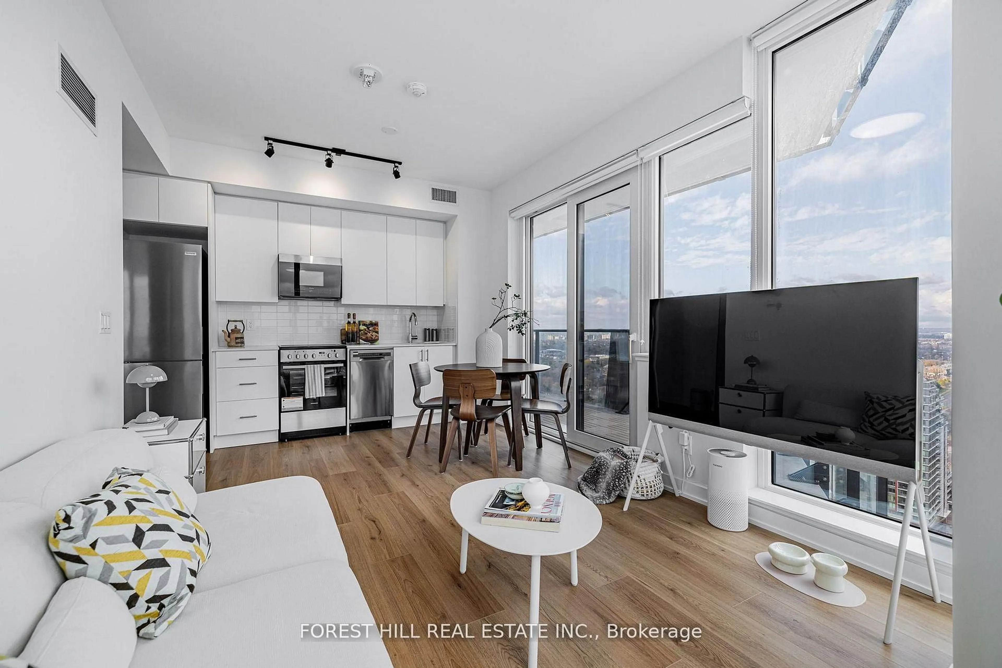 Living room with furniture, wood/laminate floor for 15 Ellerslie Ave #2910, Toronto Ontario M2N 0L7