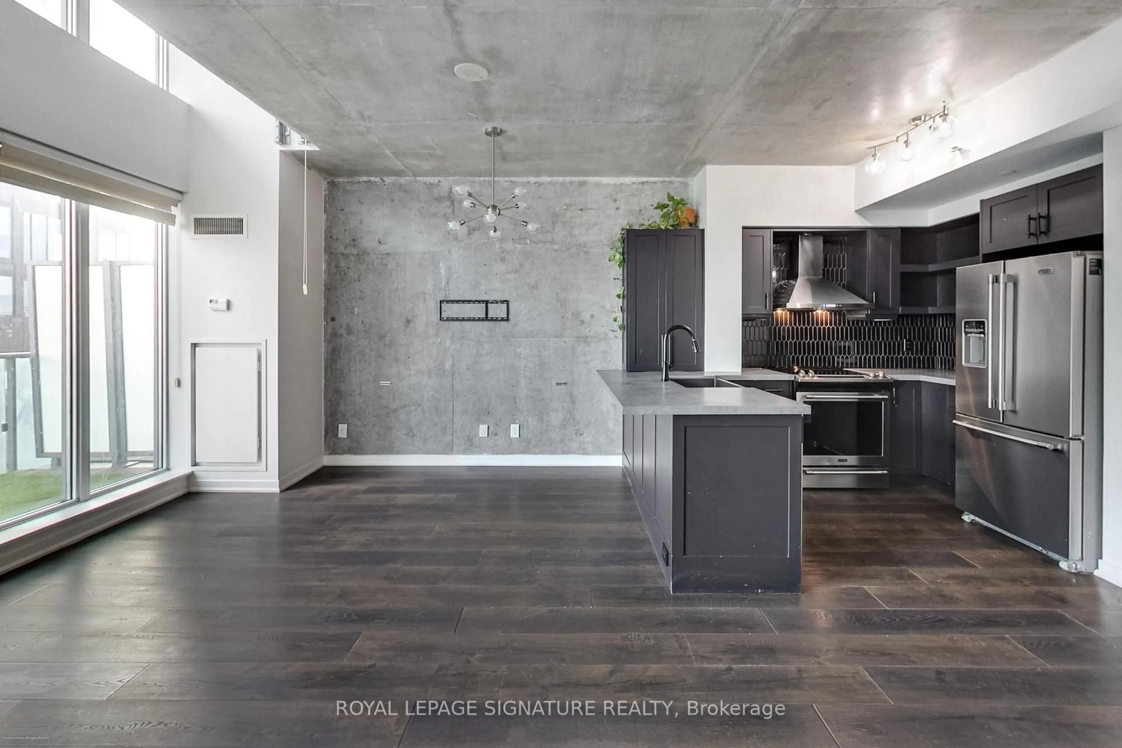 Open concept kitchen, cement floor for 150 East Liberty St #811, Toronto Ontario M6K 3R5