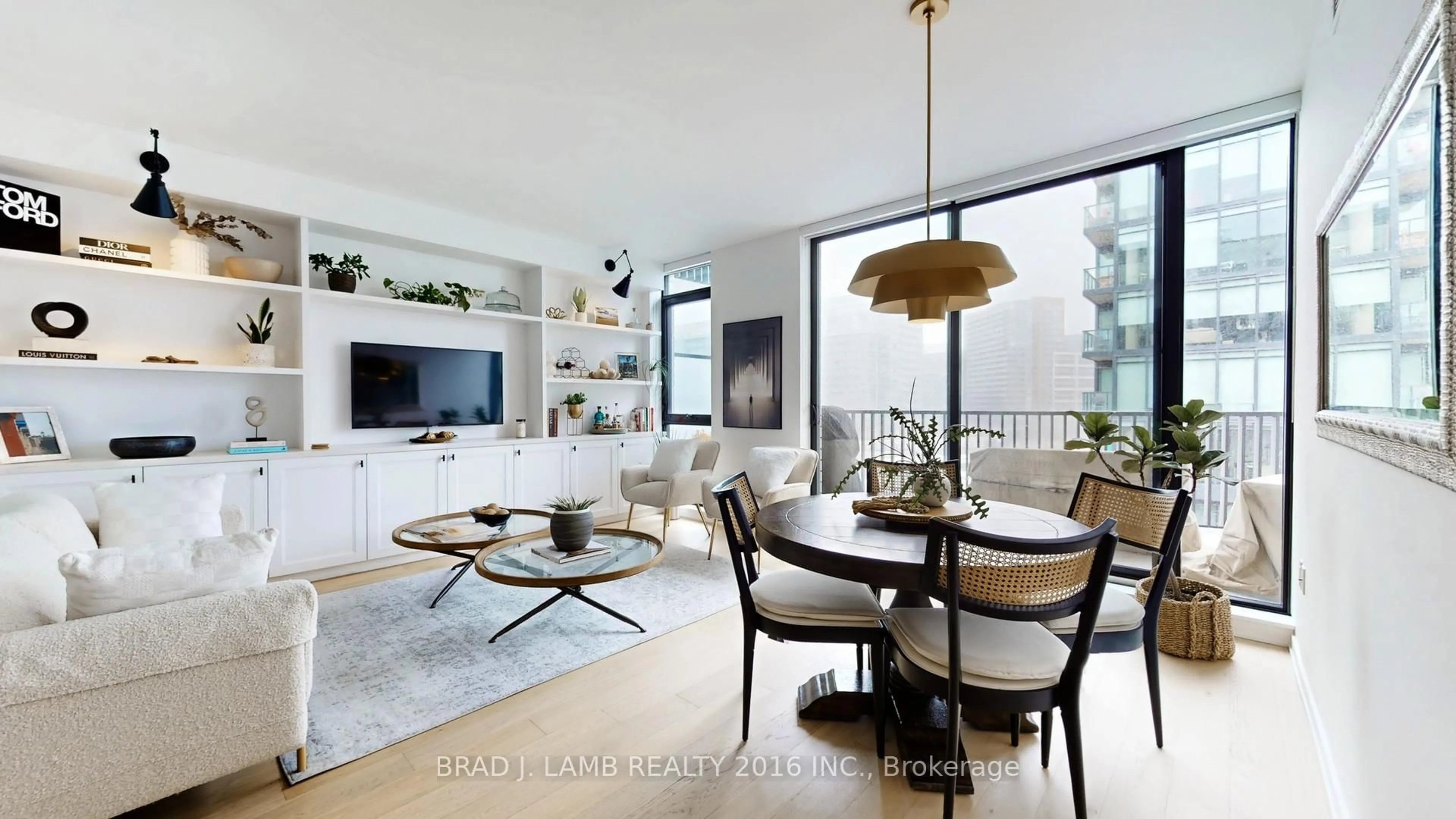 Living room with furniture, wood/laminate floor for 41 Dovercourt Rd #701, Toronto Ontario M6J 0G6