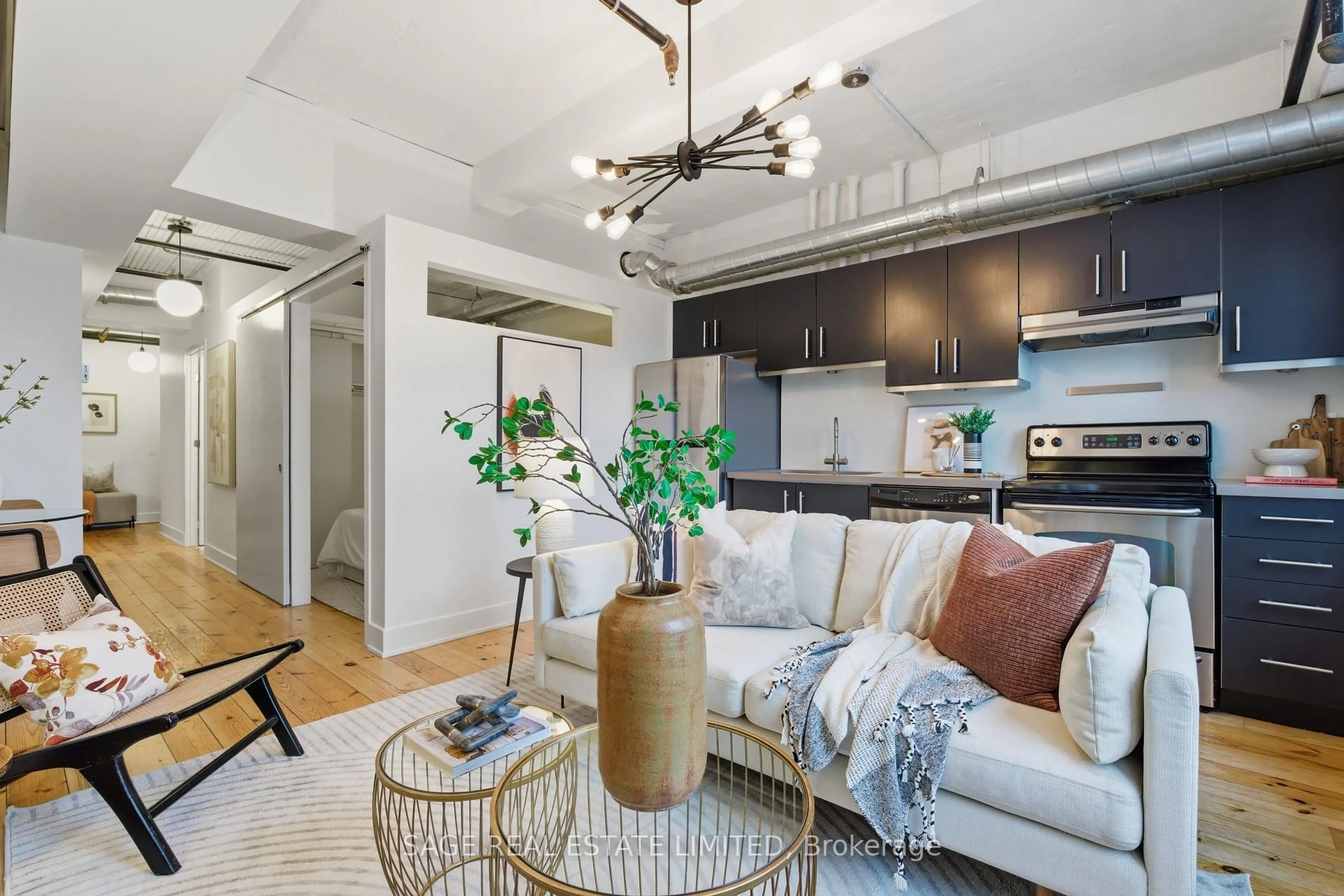 Living room with furniture, unknown for 183 Dovercourt Rd #417, Toronto Ontario M6J 3C1