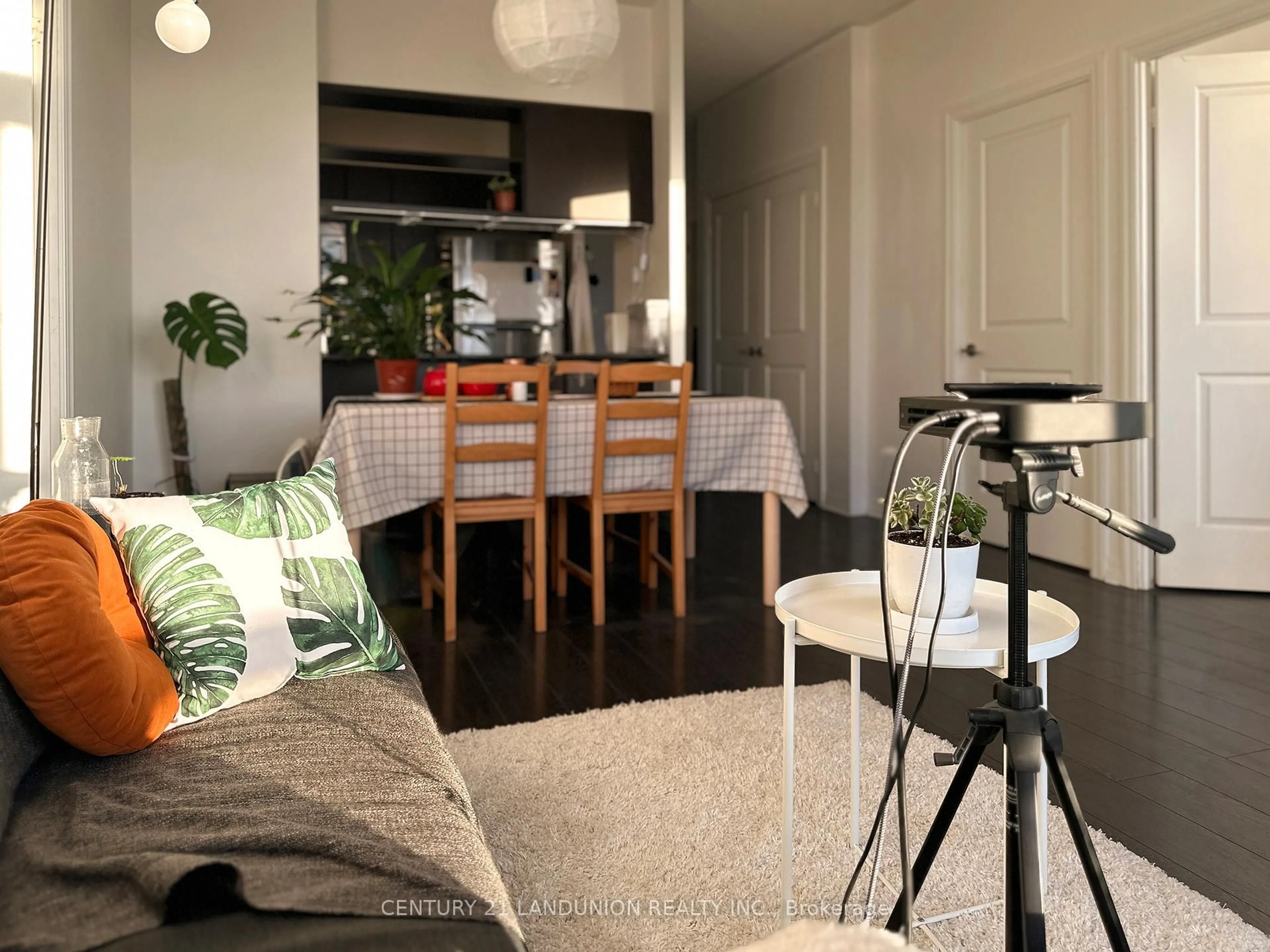 Living room with furniture, wood/laminate floor for 30 Heron's Hill Way #Ph 7, Toronto Ontario M2J 0A7