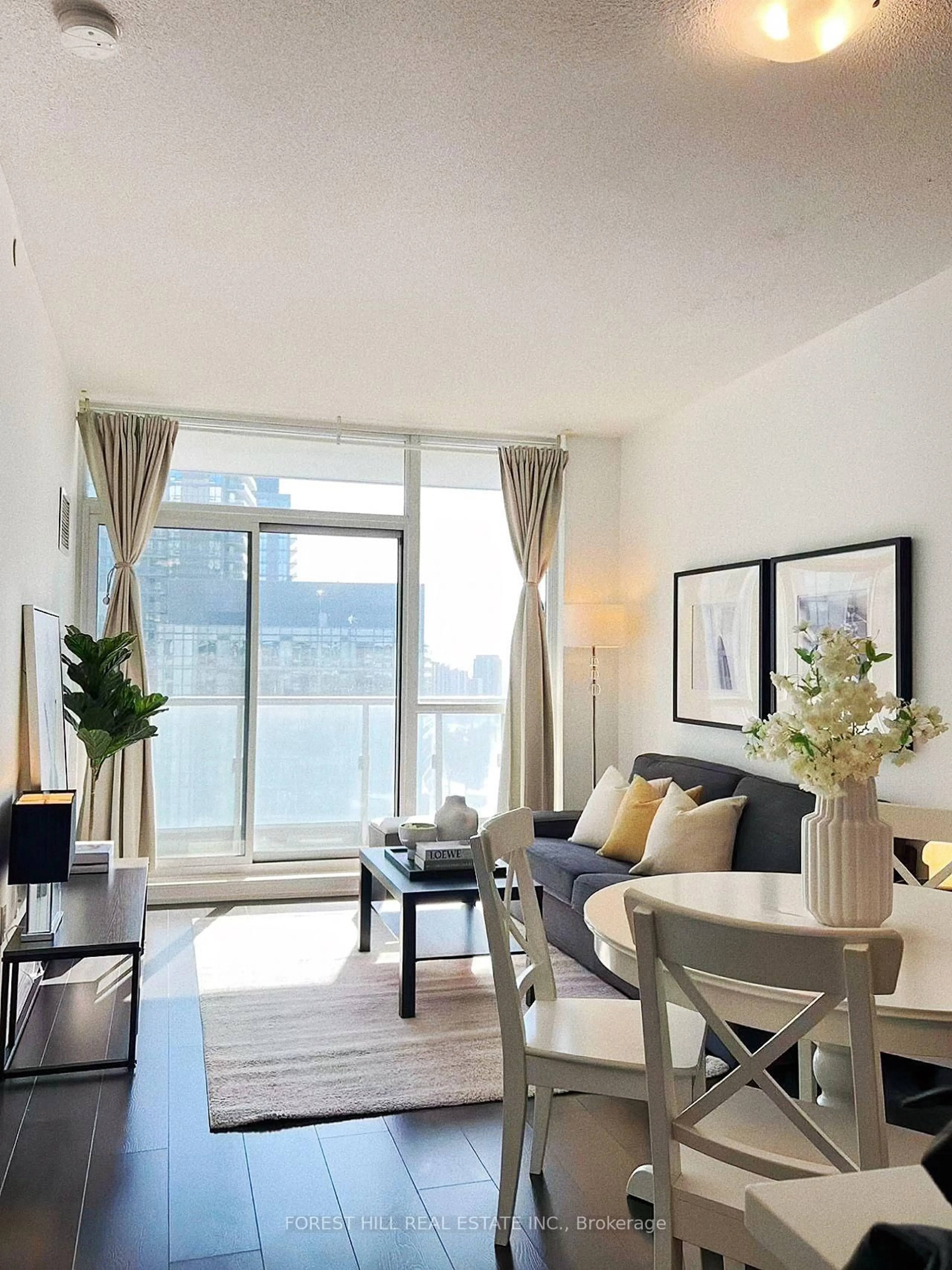 Living room with furniture, wood/laminate floor for 66 Forest Manor Rd #1110, Toronto Ontario M2J 0B7