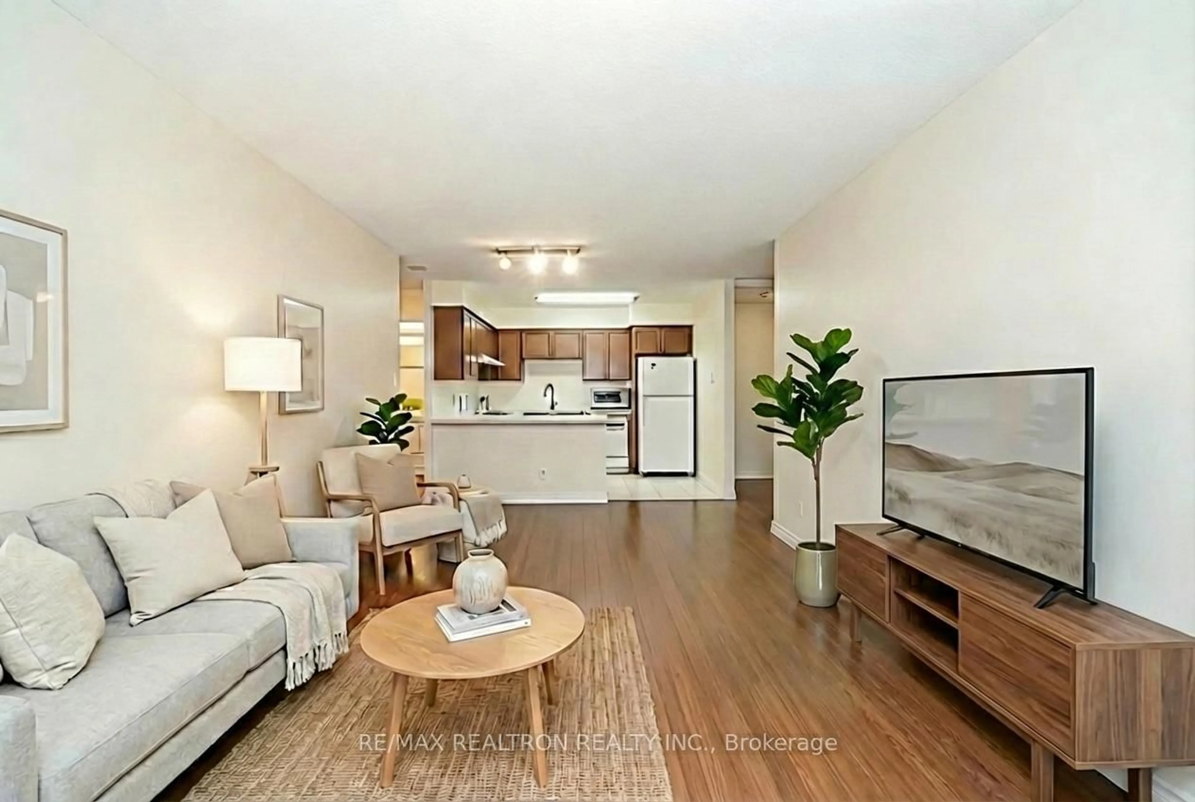 Living room with furniture, wood/laminate floor for 256 Doris Ave #511, Toronto Ontario M2N 6X8