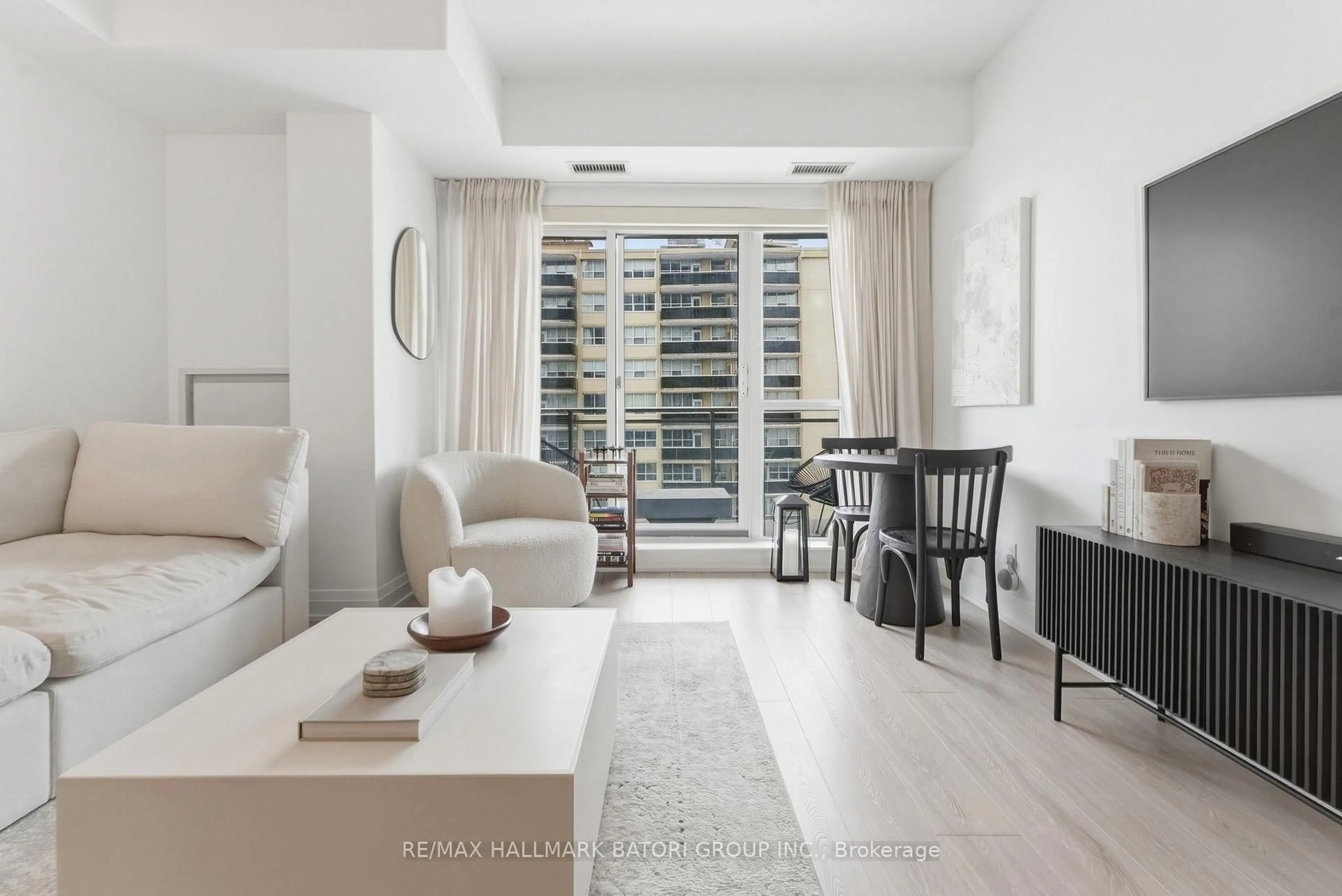 Living room with furniture, unknown for 83 Redpath Ave #1009, Toronto Ontario M4S 0A2