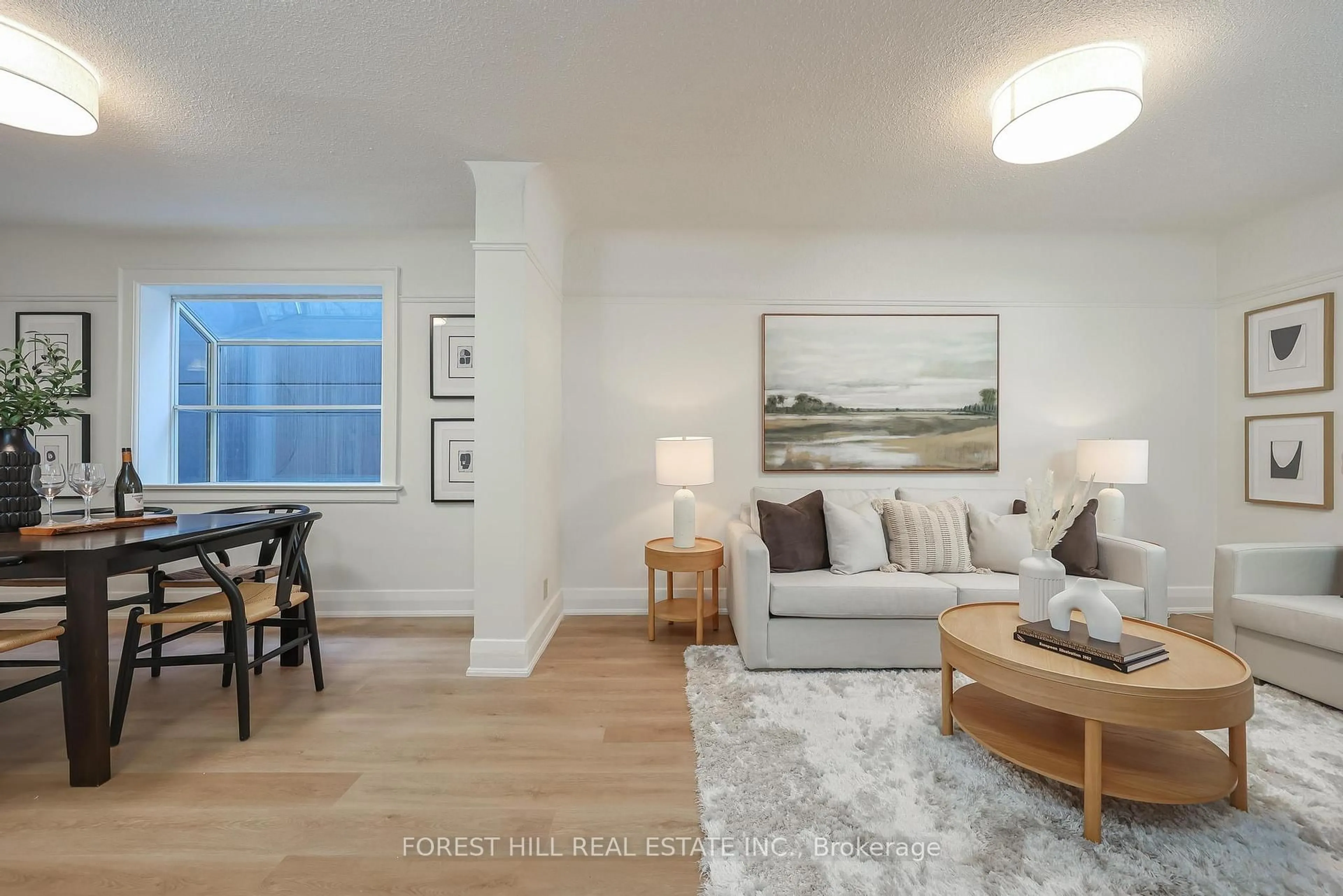 Living room with furniture, wood/laminate floor for 33 Glengarry Ave, Toronto Ontario M5M 1C8