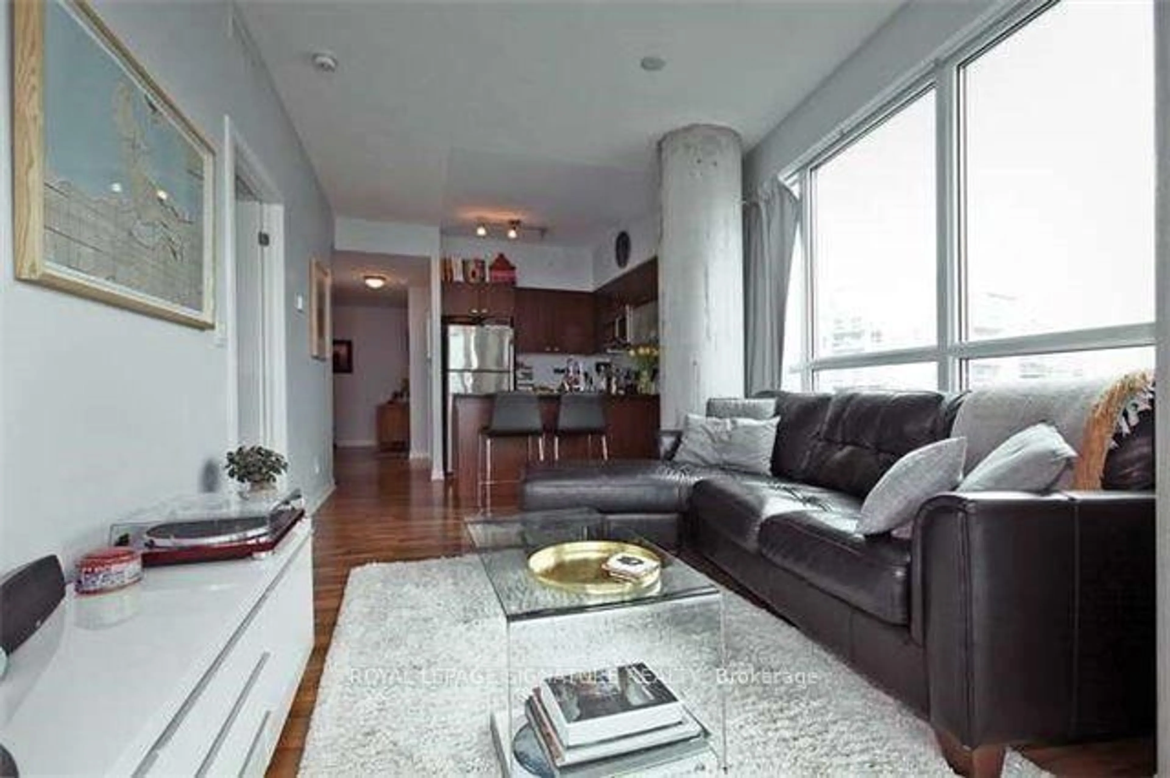 Living room with furniture, wood/laminate floor for 150 East Liberty St #1905, Toronto Ontario M6K 3R5