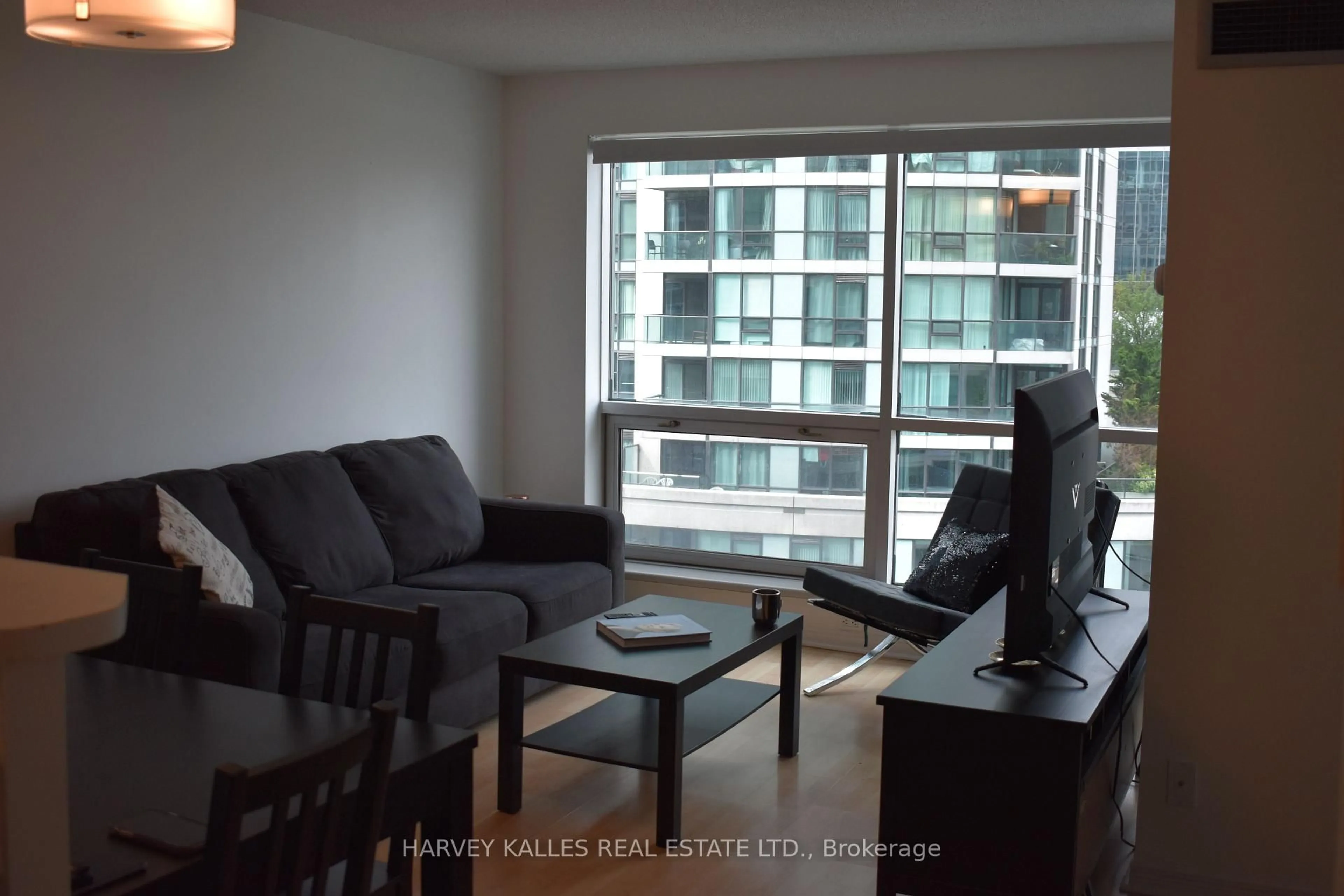 Living room with furniture, wood/laminate floor for 10 Yonge St #705, Toronto Ontario M5J 1R4
