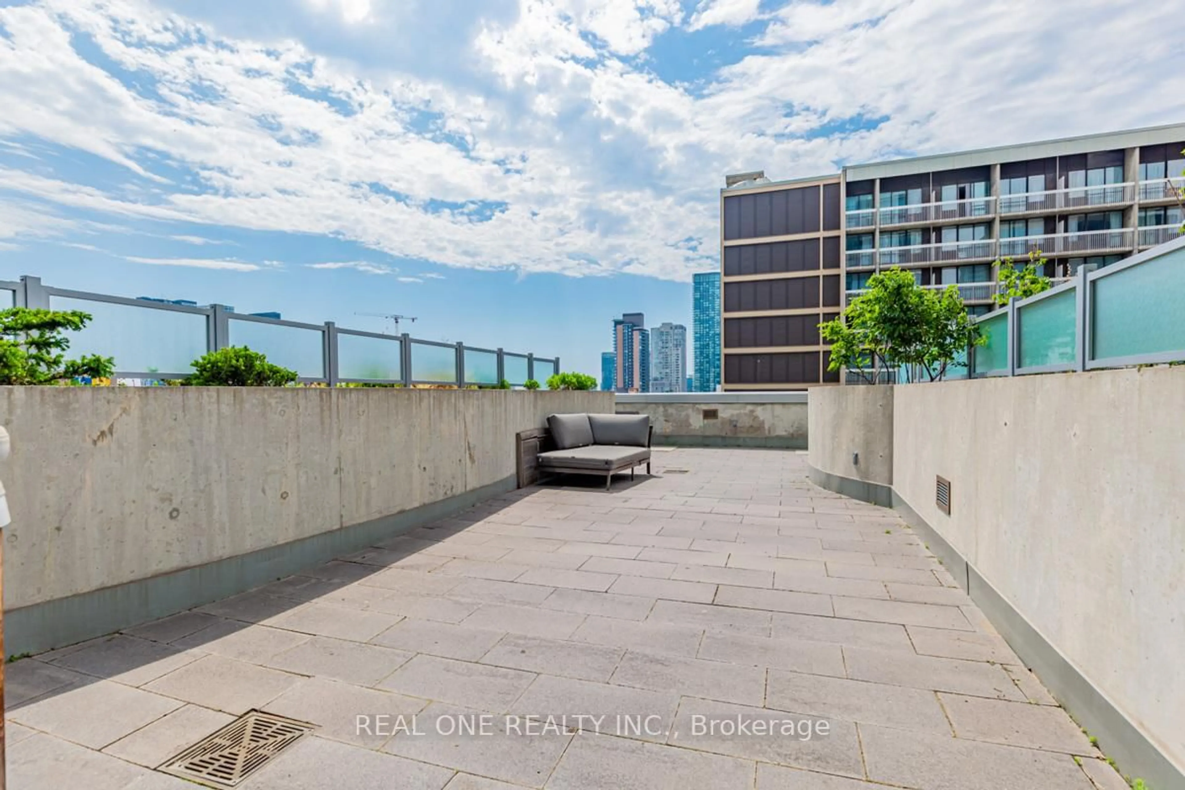 Patio, city buildings view from balcony for 386 Yonge St #1408, Toronto Ontario M5B 0A5