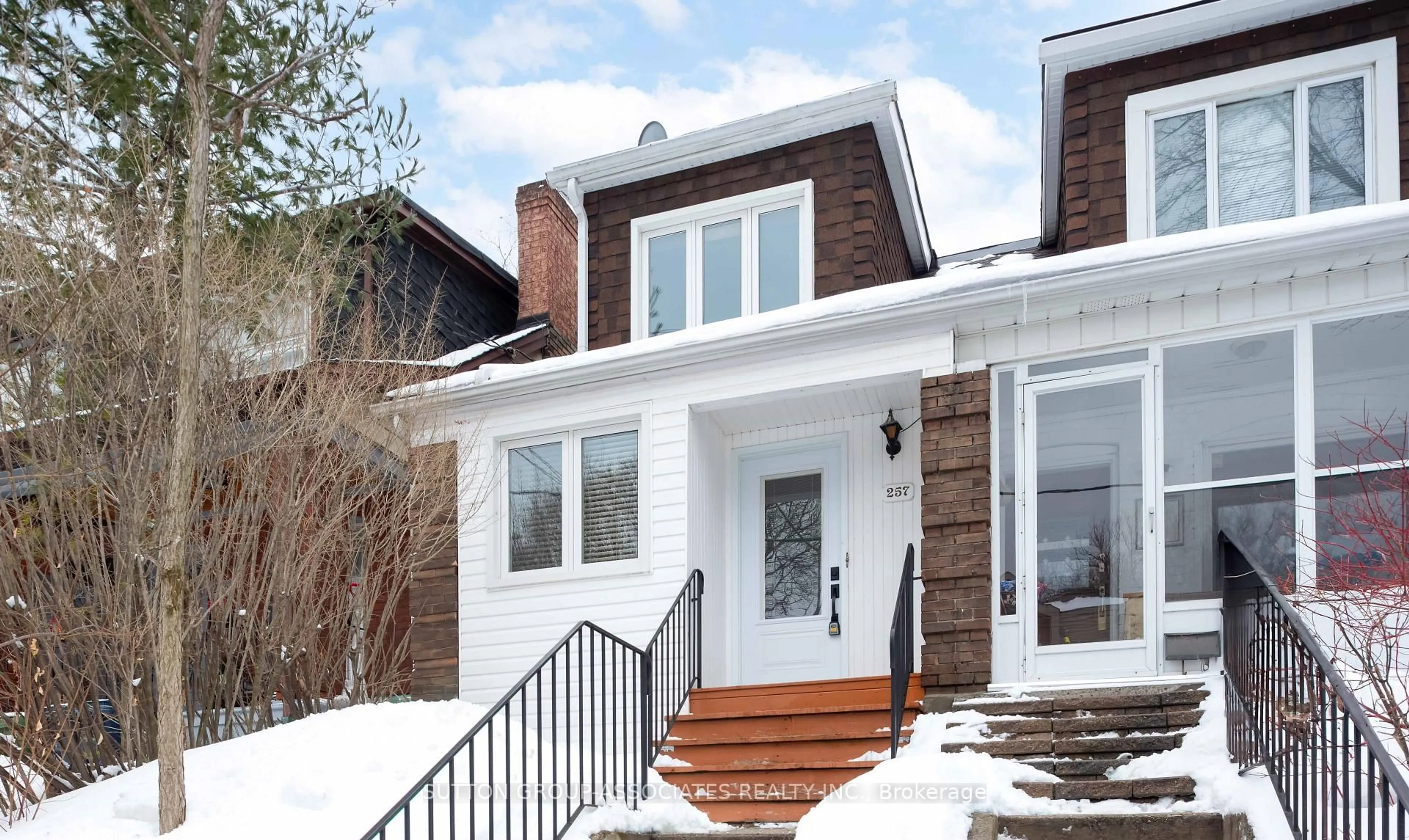 Home with brick exterior material, street for 257 Benson Ave, Toronto Ontario M6G 2J7