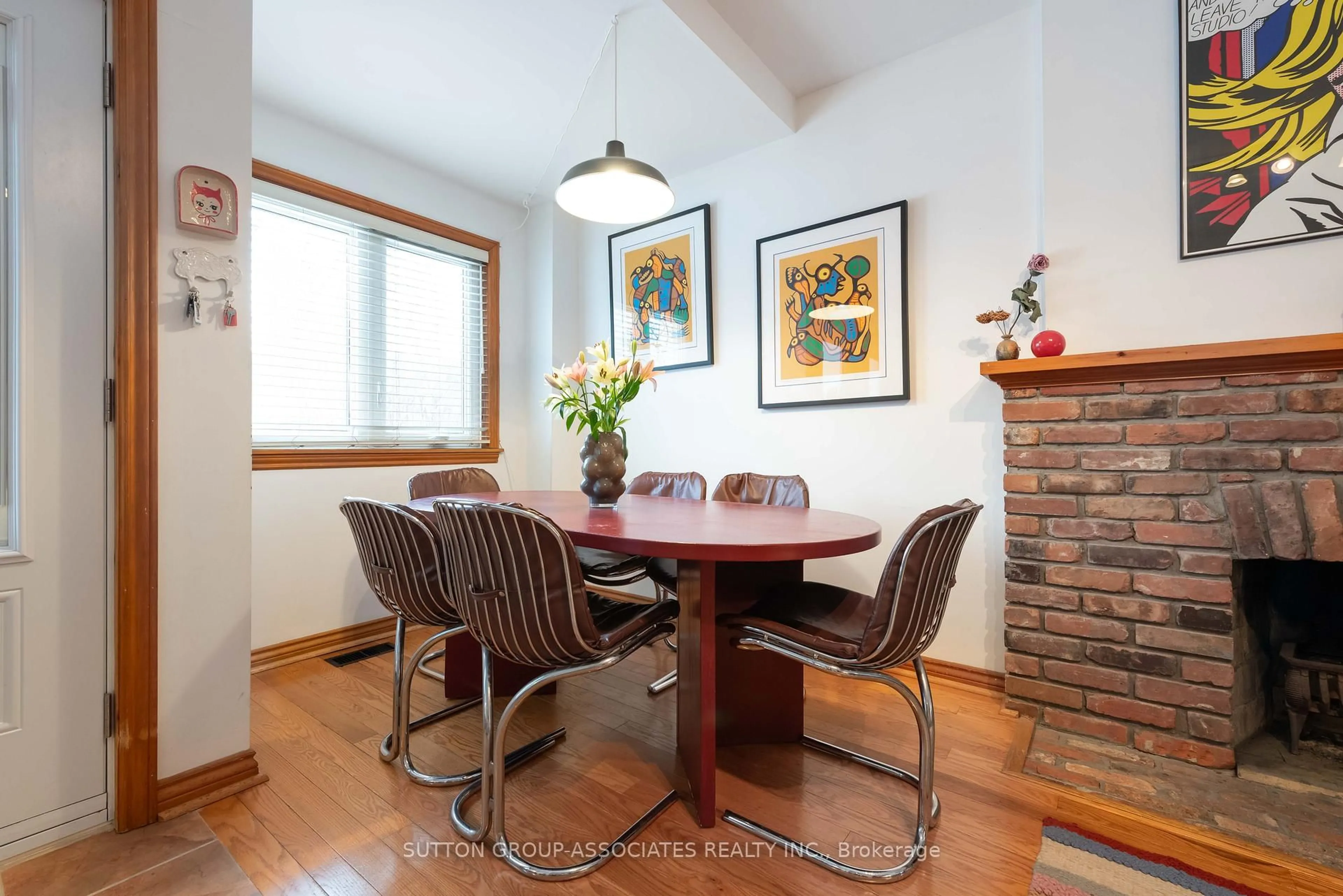 Dining room, wood/laminate floor for 257 Benson Ave, Toronto Ontario M6G 2J7